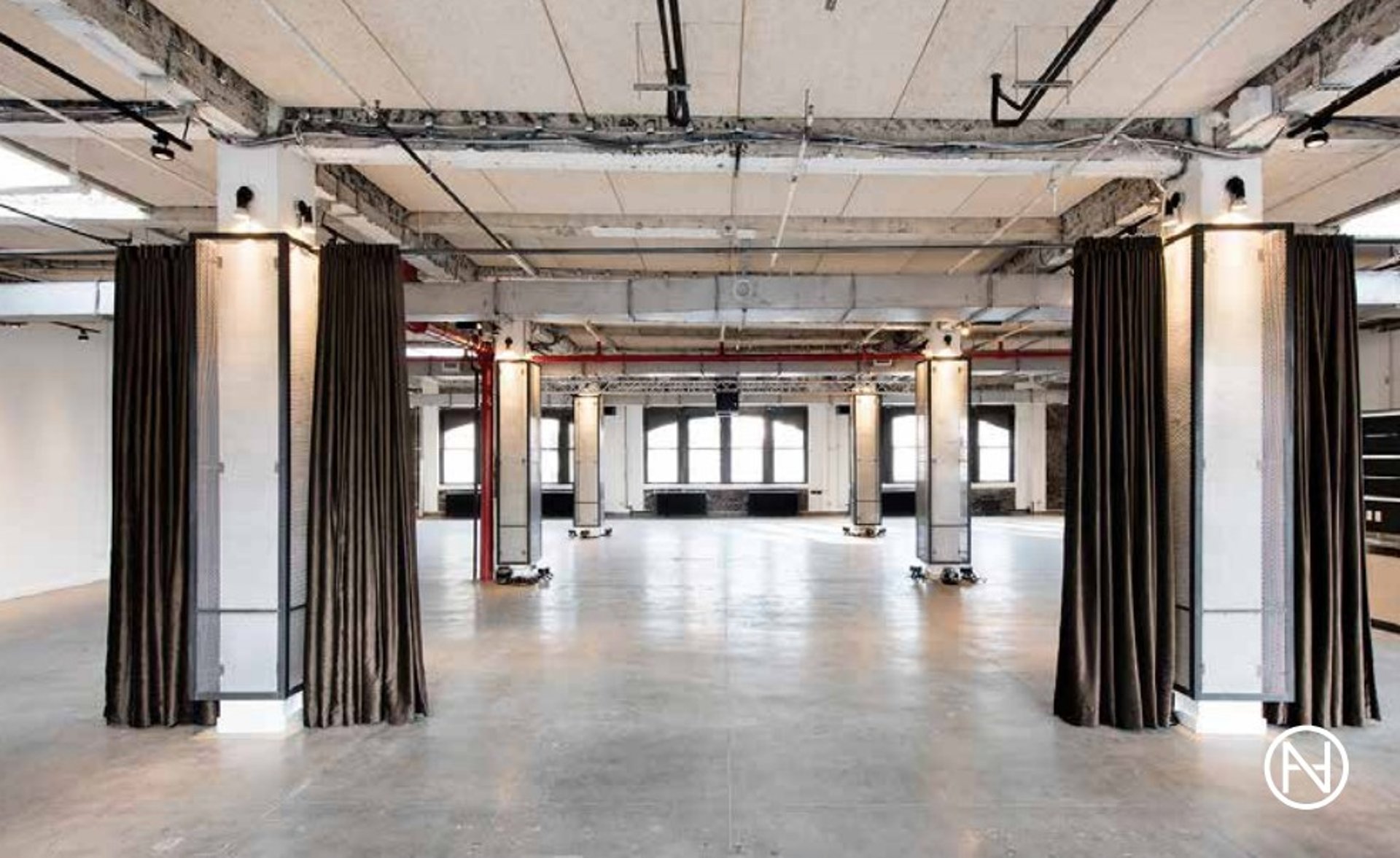 Penthouse event space with high ceilings at NeueHouse Madison Square, perfect for gatherings.