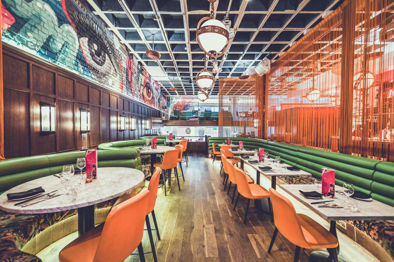 Vibrant BLVD Spinningfields restaurant with modern decor, ideal for events and gatherings.