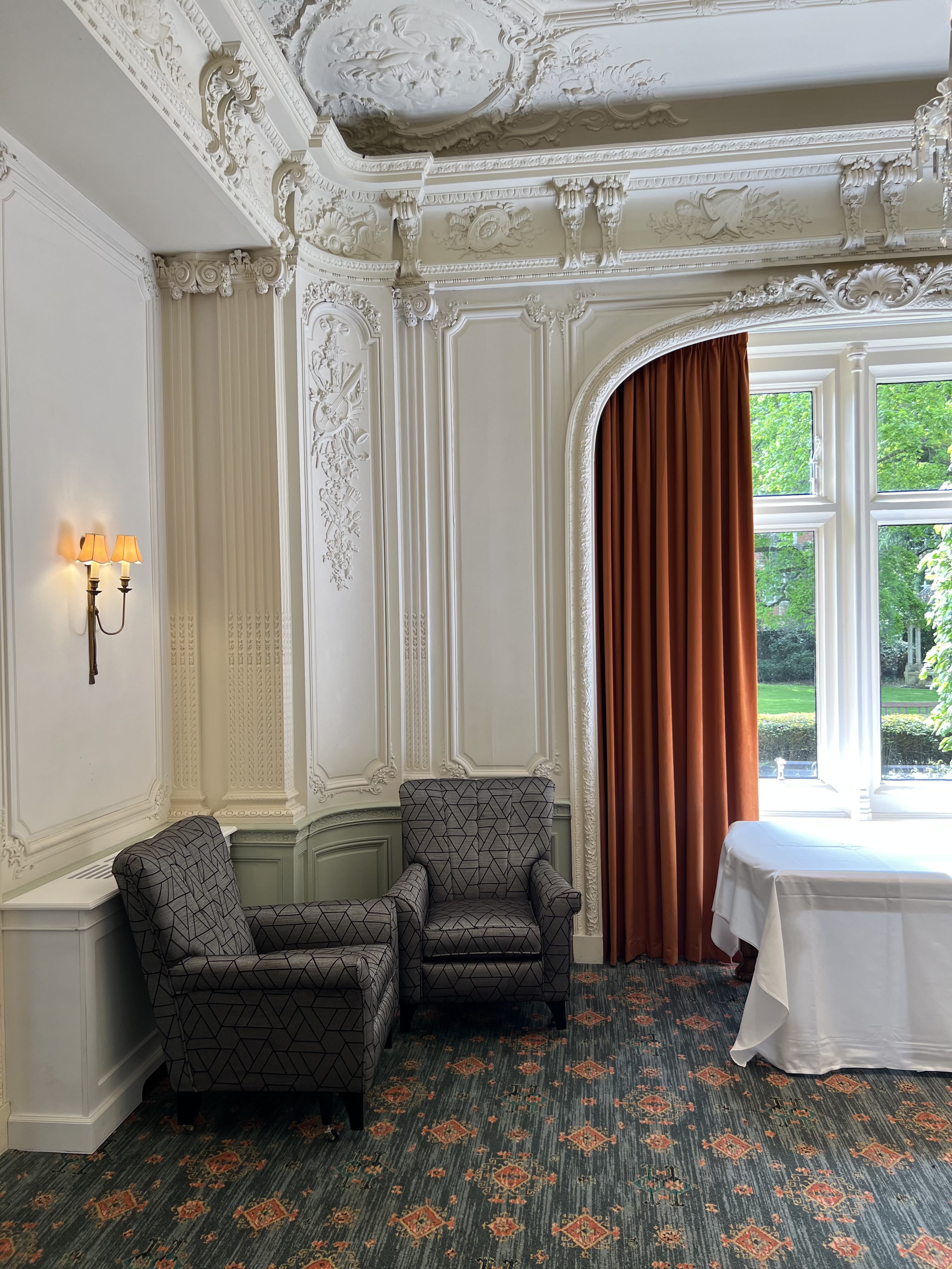 Elegant meeting space with lavender decor at Warren House Hotel, perfect for gatherings.