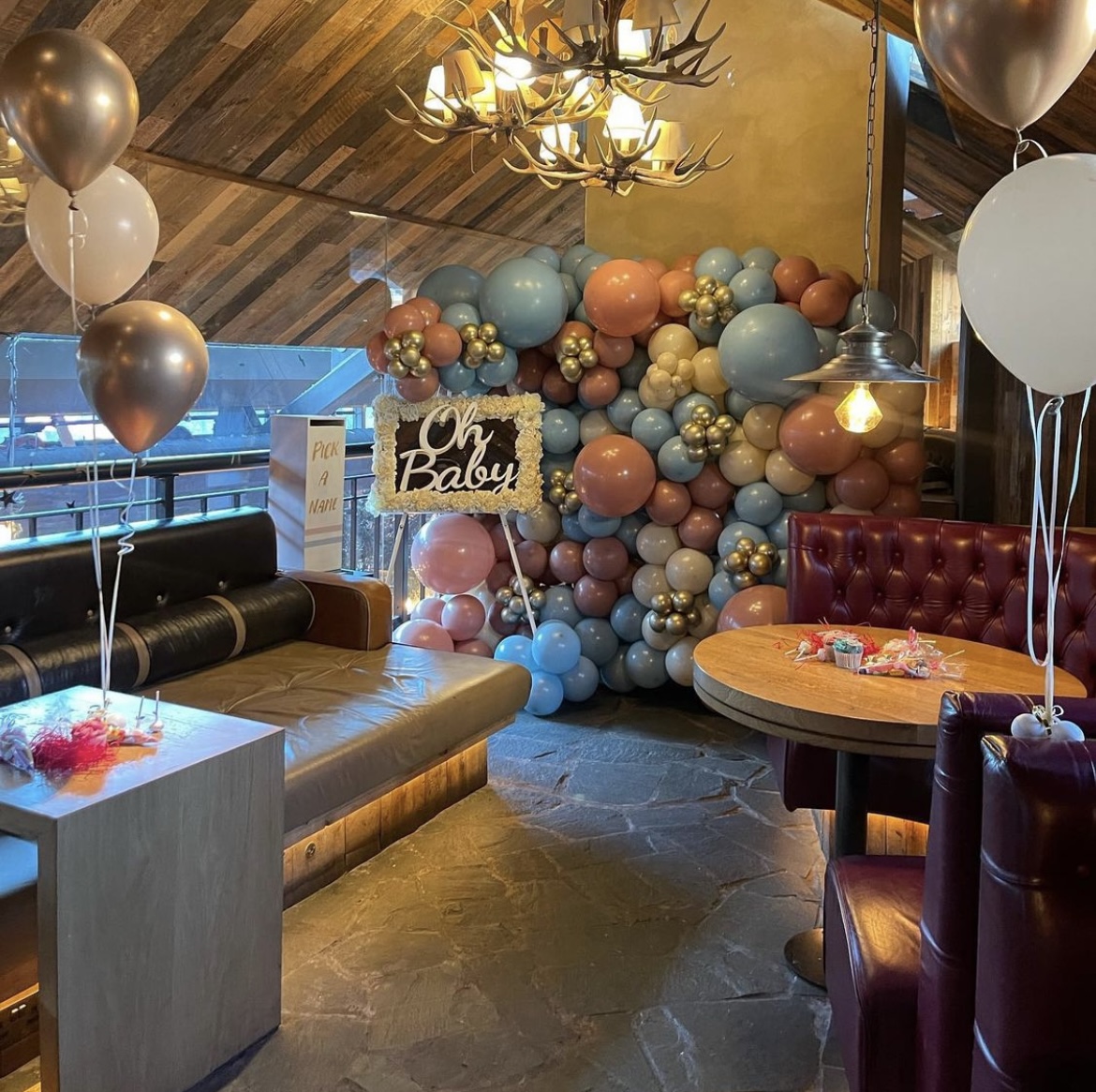 Pastel balloon wall in Gin Nest, Manchester for a charming baby shower event.