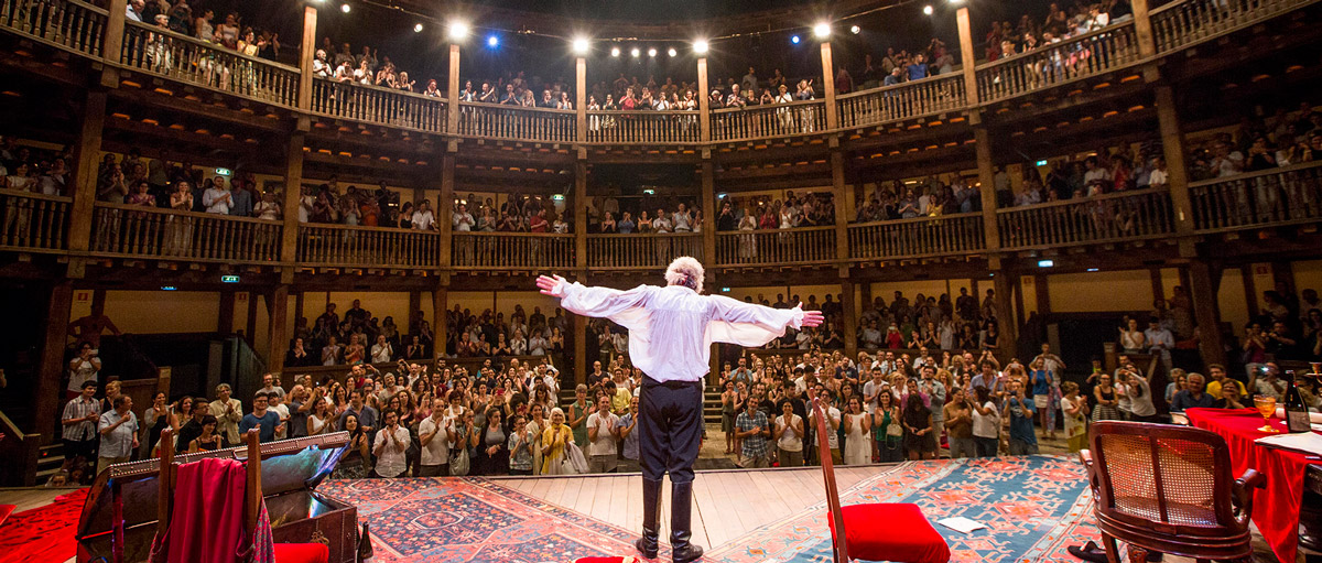 Vibrant Globe Theatre performance with engaged audience, showcasing live events and storytelling.