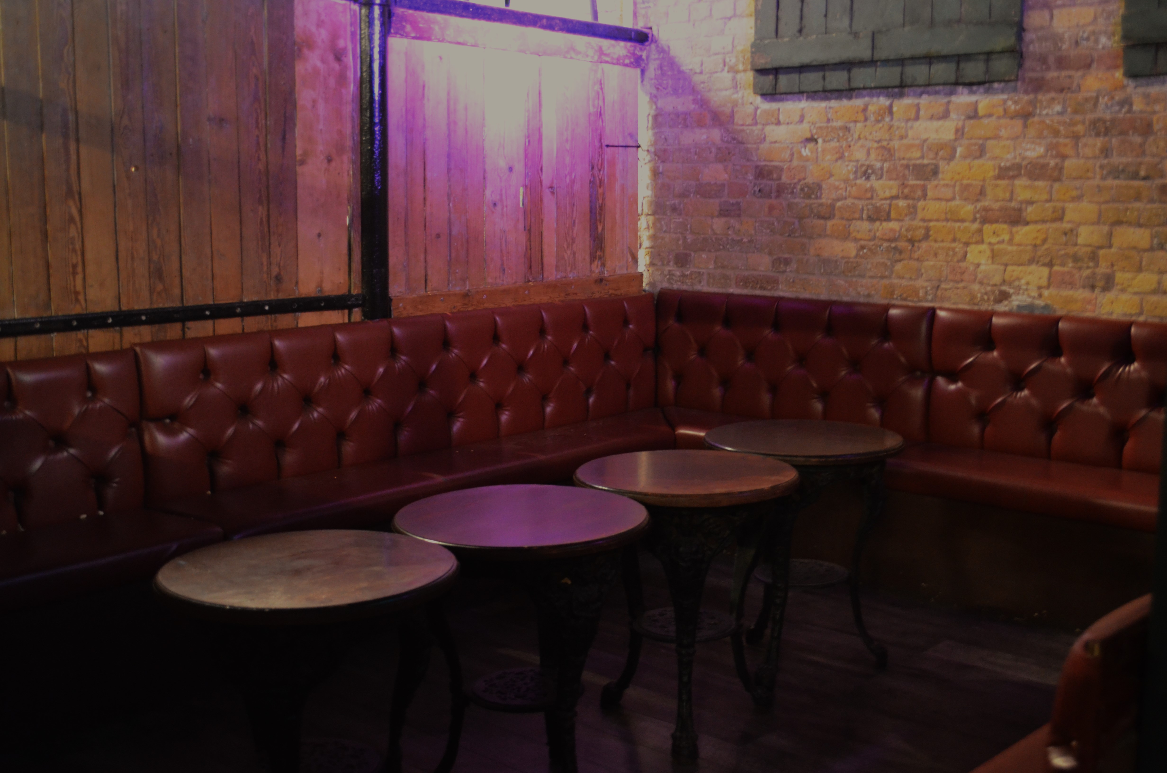 Cozy seating area in The Warehouse, Camden for networking events and gatherings.