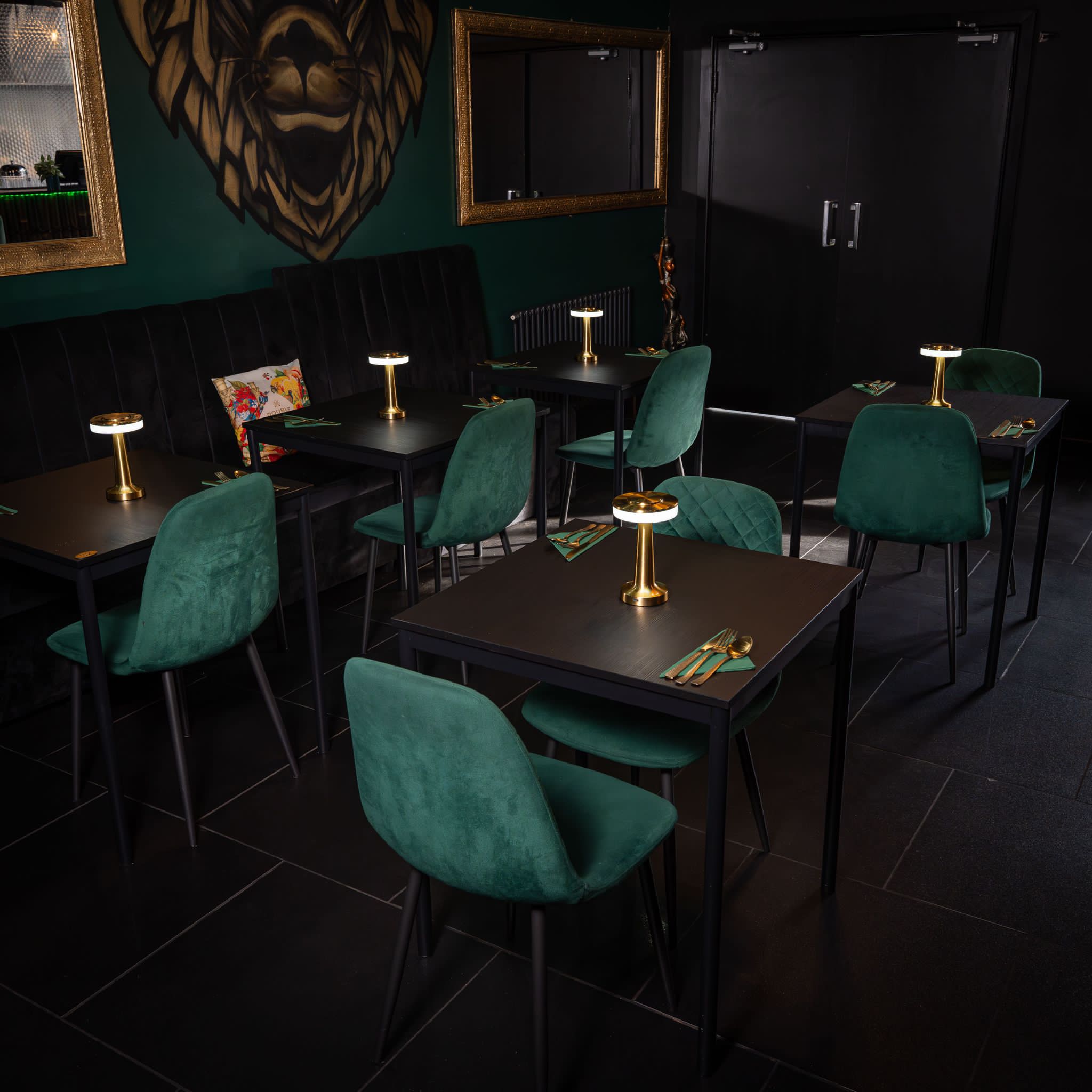 Stylish dining setup at Jungle Bar & Grill, ideal for intimate gatherings and networking events.