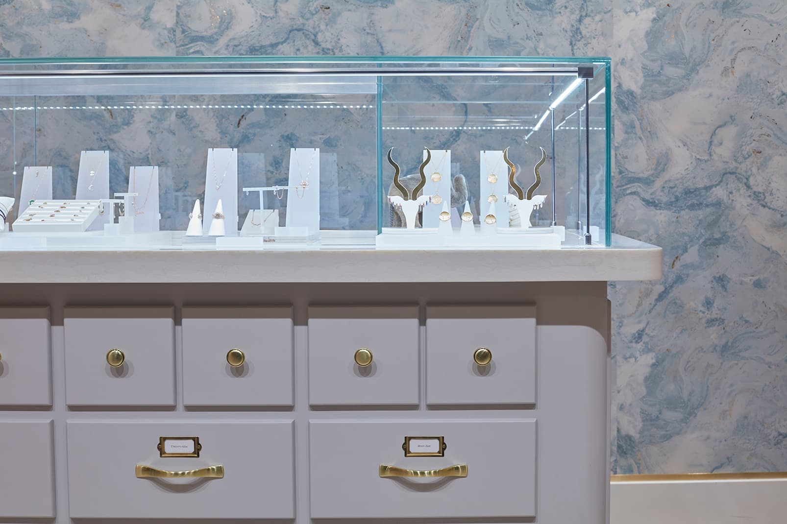 Sleek jewelry display case at The Alkemistry for upscale events and celebrations.