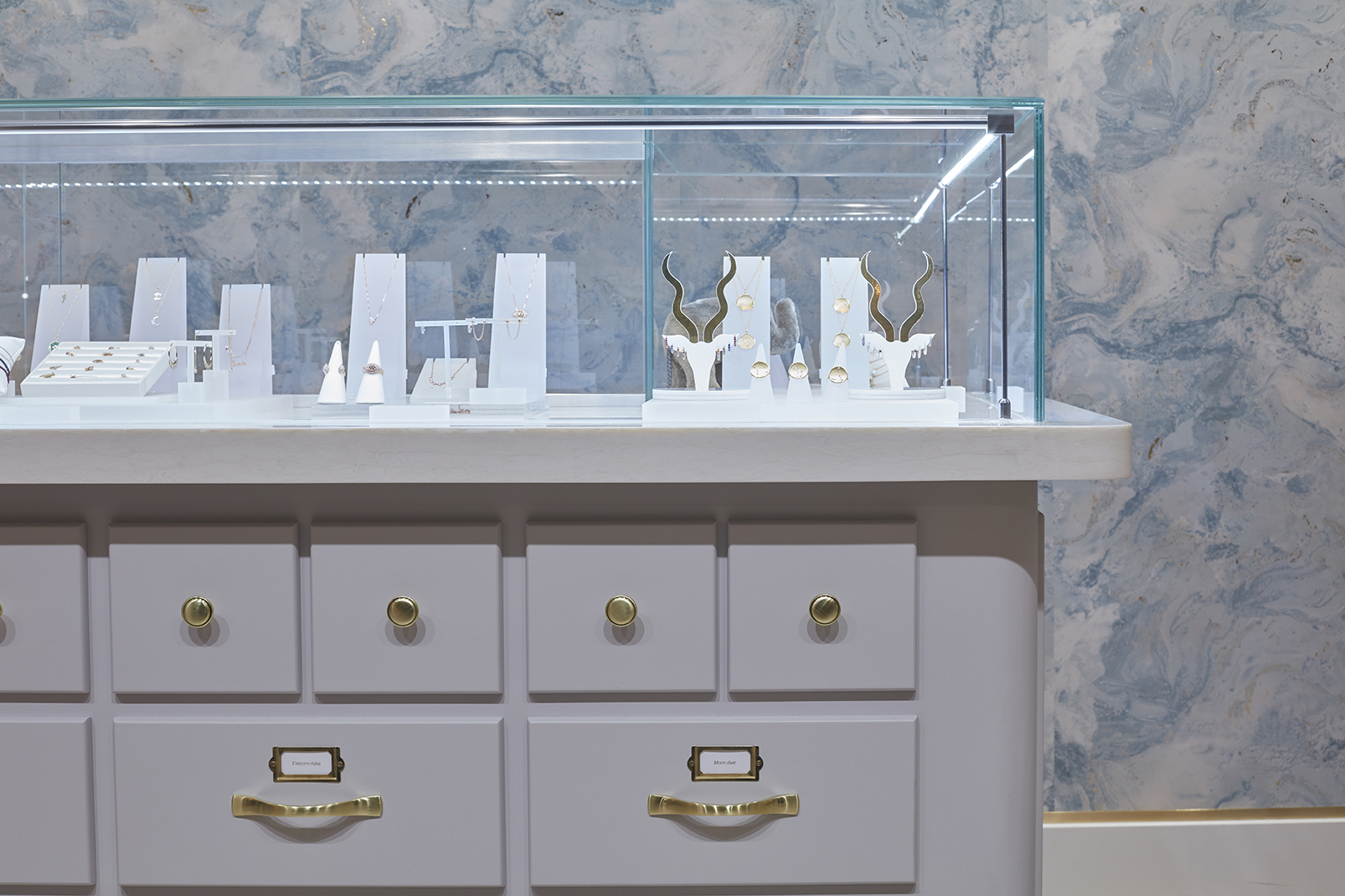 Sleek jewelry display case at The Alkemistry for upscale events and luxury gatherings.