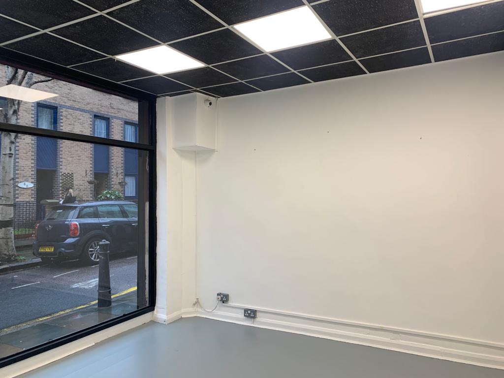 Blank meeting space with natural light for customizable events at Space 61 gallery.