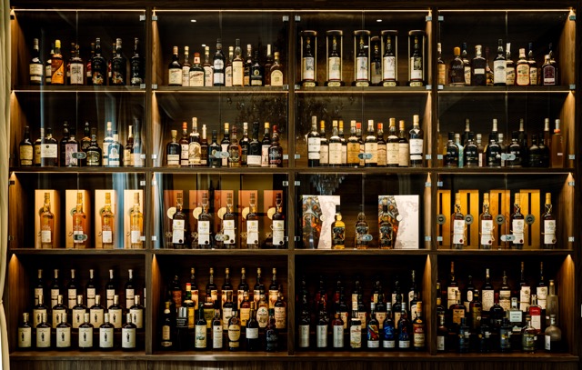 Premium spirits display at VCLUB Whisky Lounge for elegant events and networking.