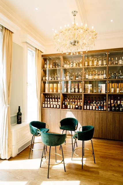 Stylish bar display at VCLUB Whisky Lounge, ideal for networking events and gatherings.