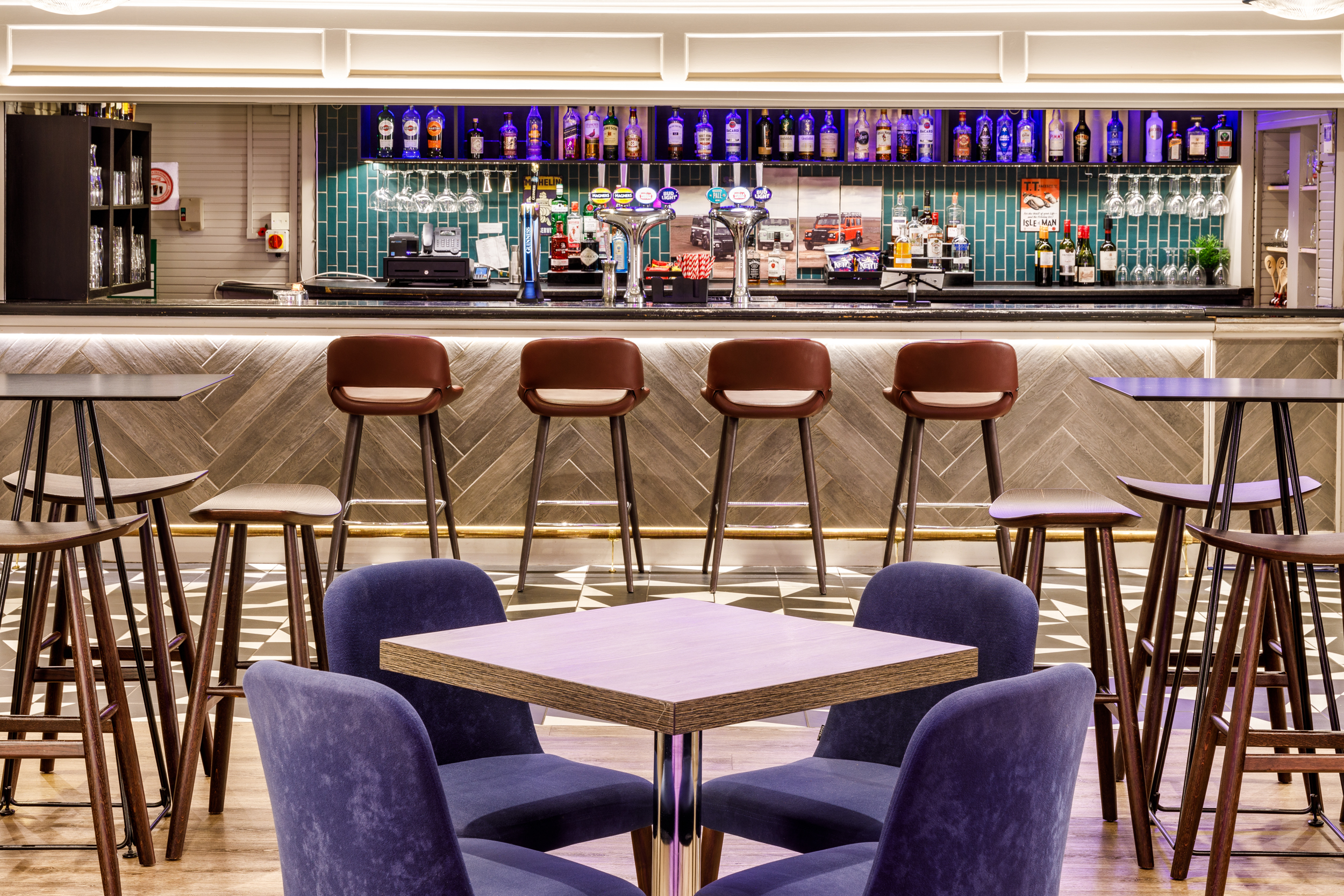 Modern bar at Mercure Birmingham West Hotel, ideal for networking events and gatherings.