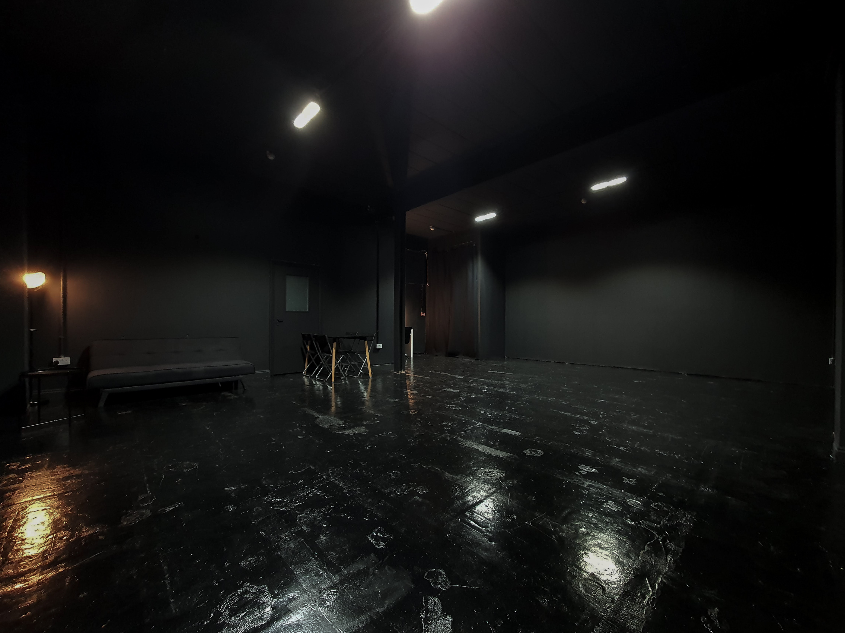 Versatile all-black event space in Studio 3, perfect for workshops and private parties.