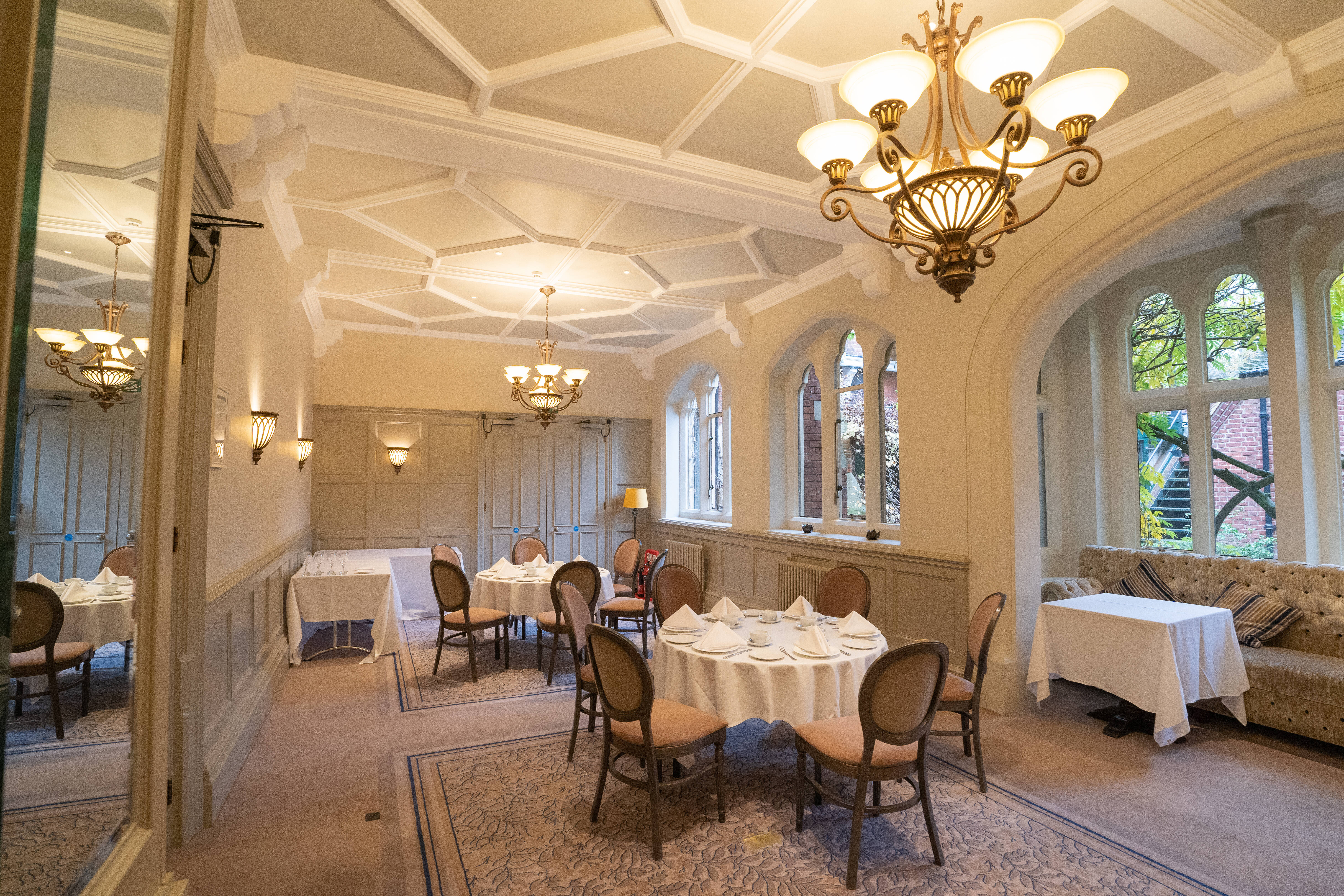 Elegant Wisteria meeting space with coffered ceiling for upscale events and gatherings.