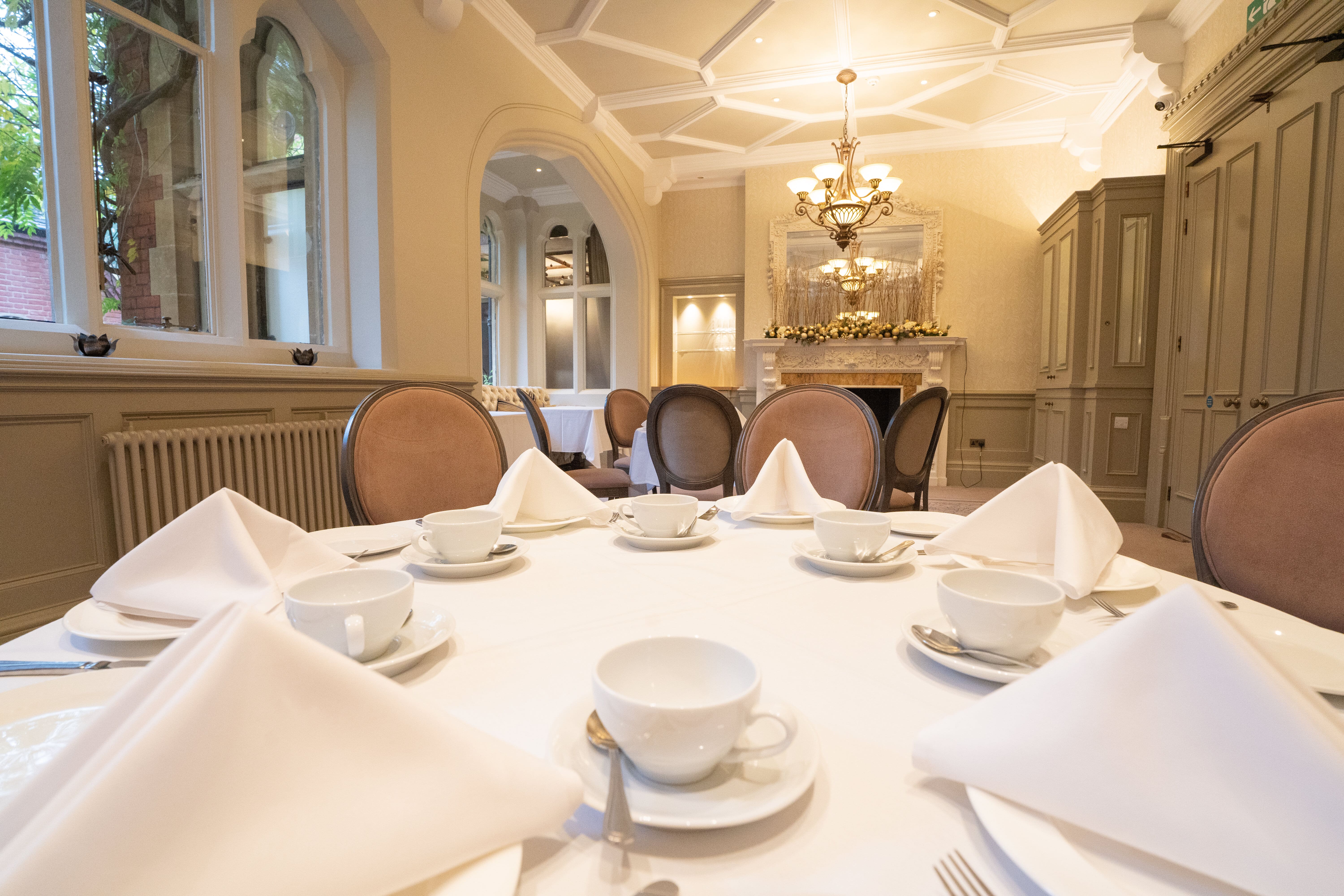 Elegant dining table with fine china at Warren House Hotel for corporate events.