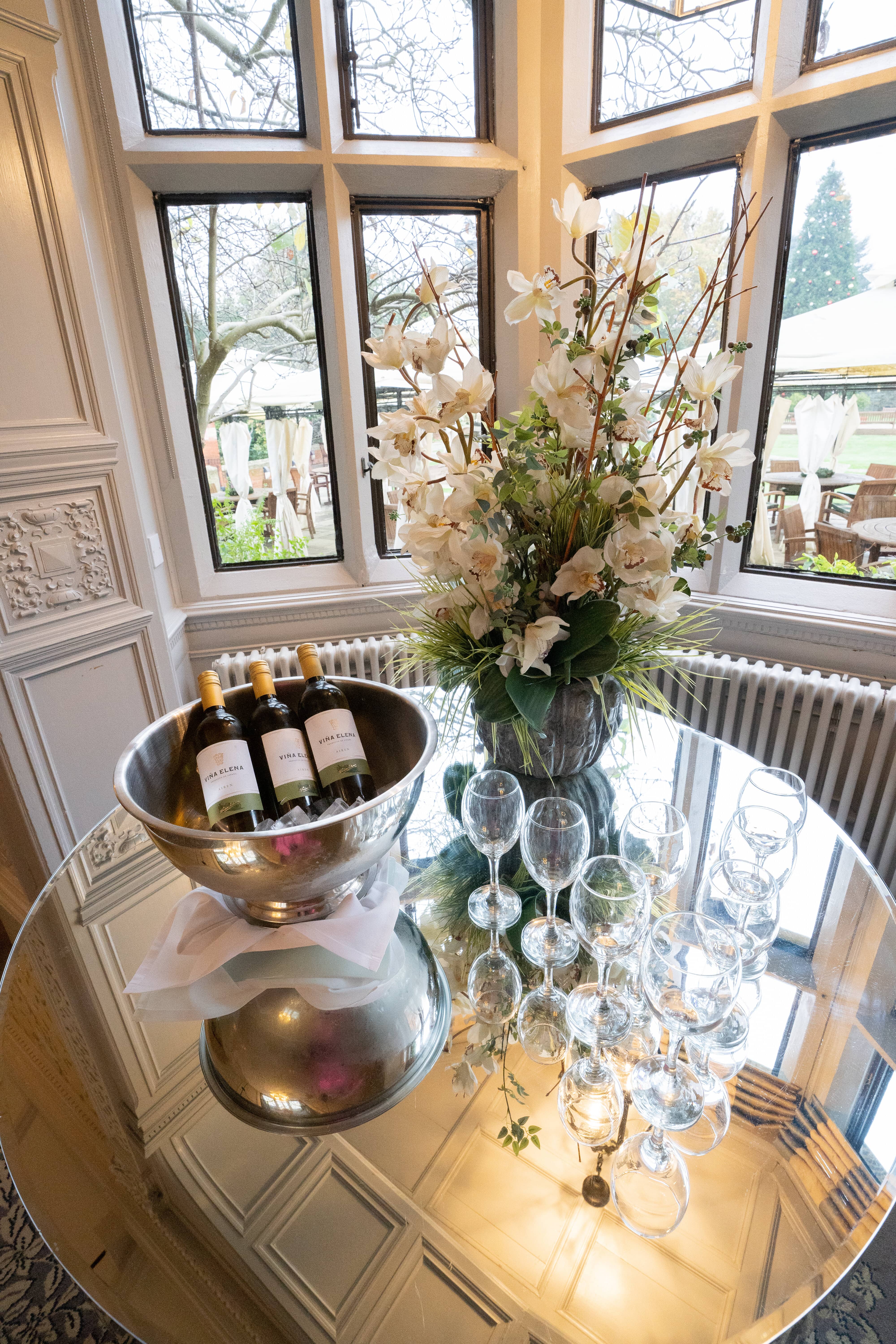 Elegant wine display at Four Seasons Warren House Hotel for networking events.