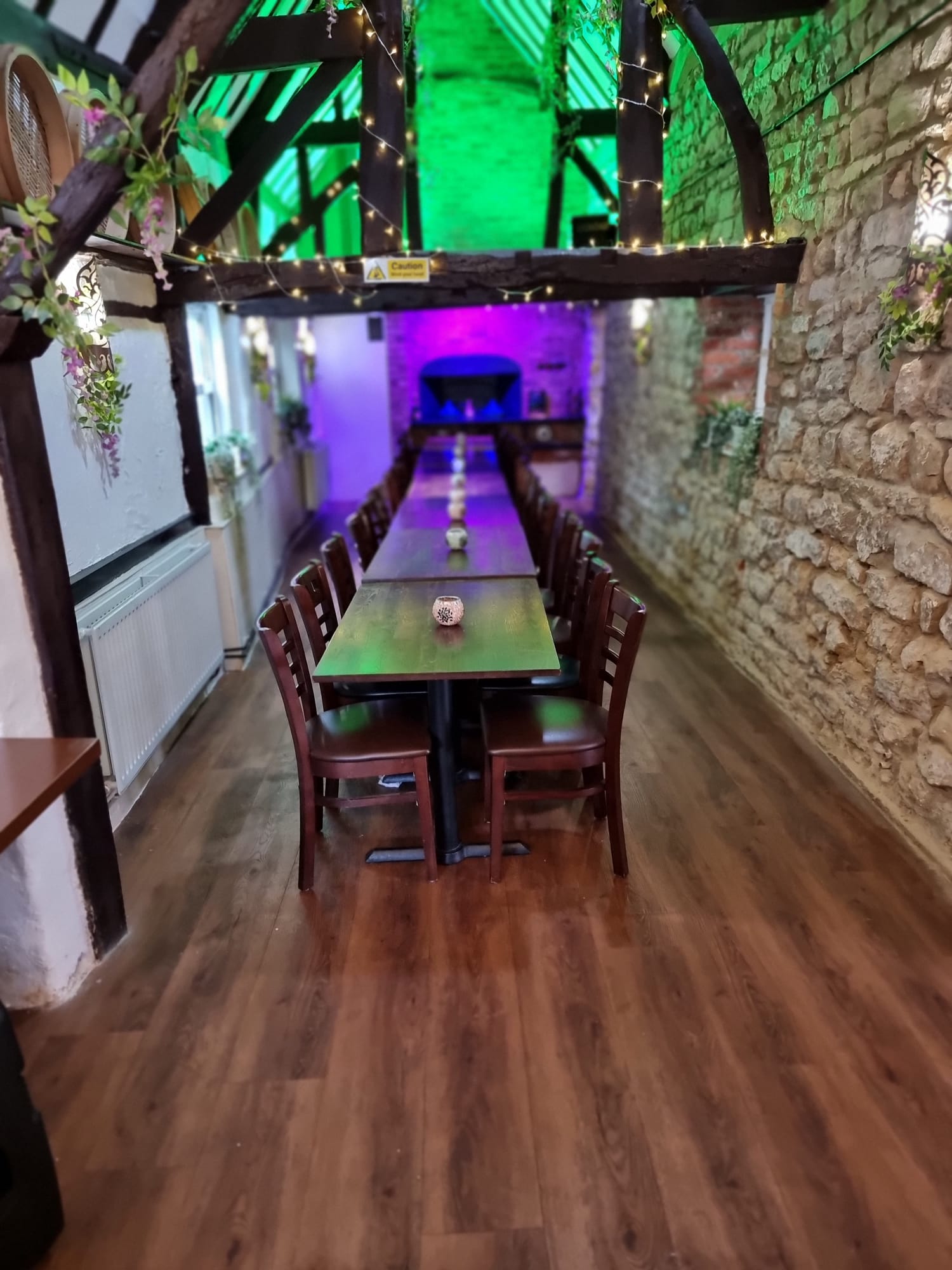 Elegant dining table in rustic Casbah Restaurant, ideal for intimate gatherings and corporate events.