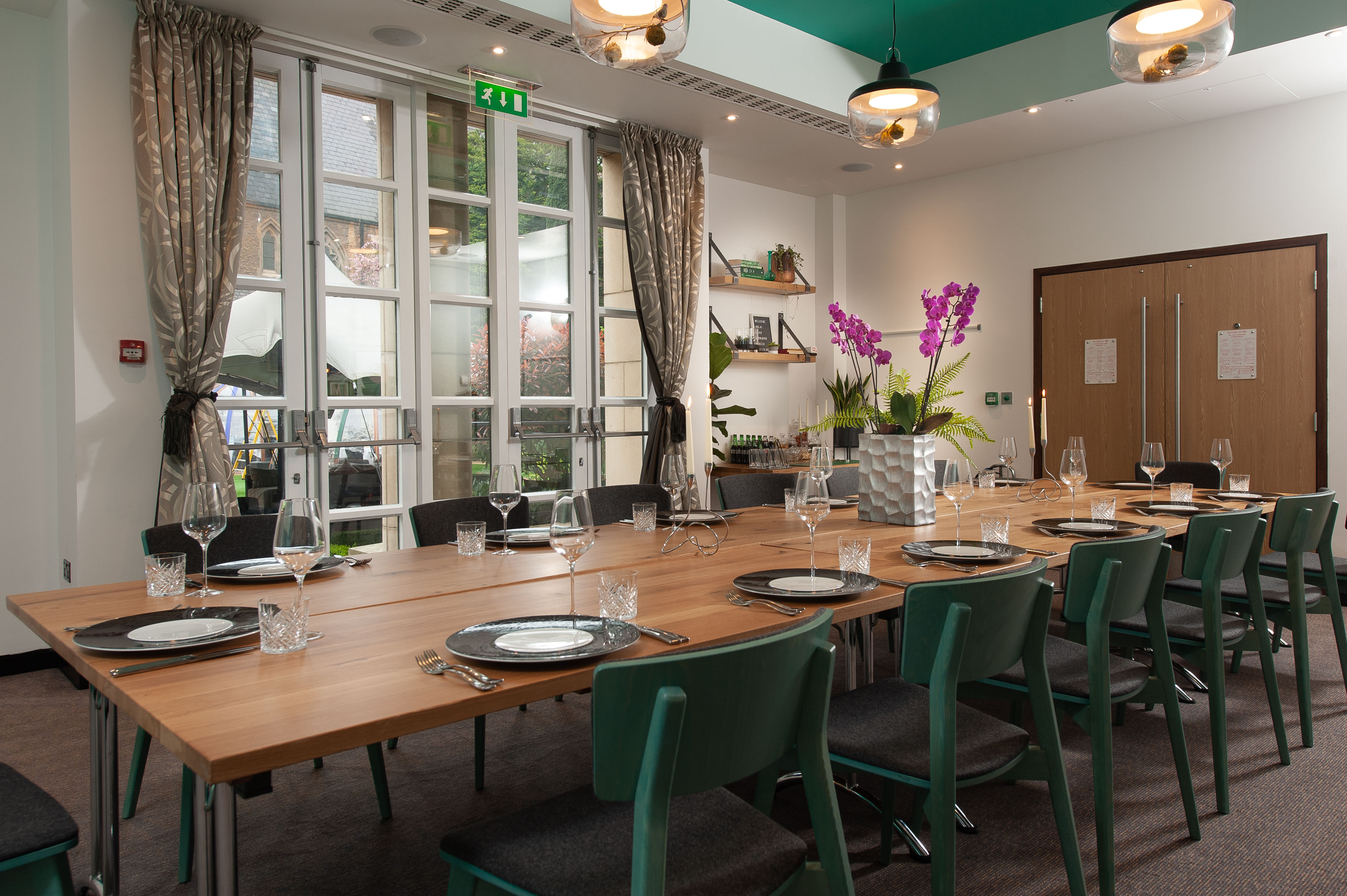 Garden Room at DoubleTree London Kensington, elegant meeting space with natural light.