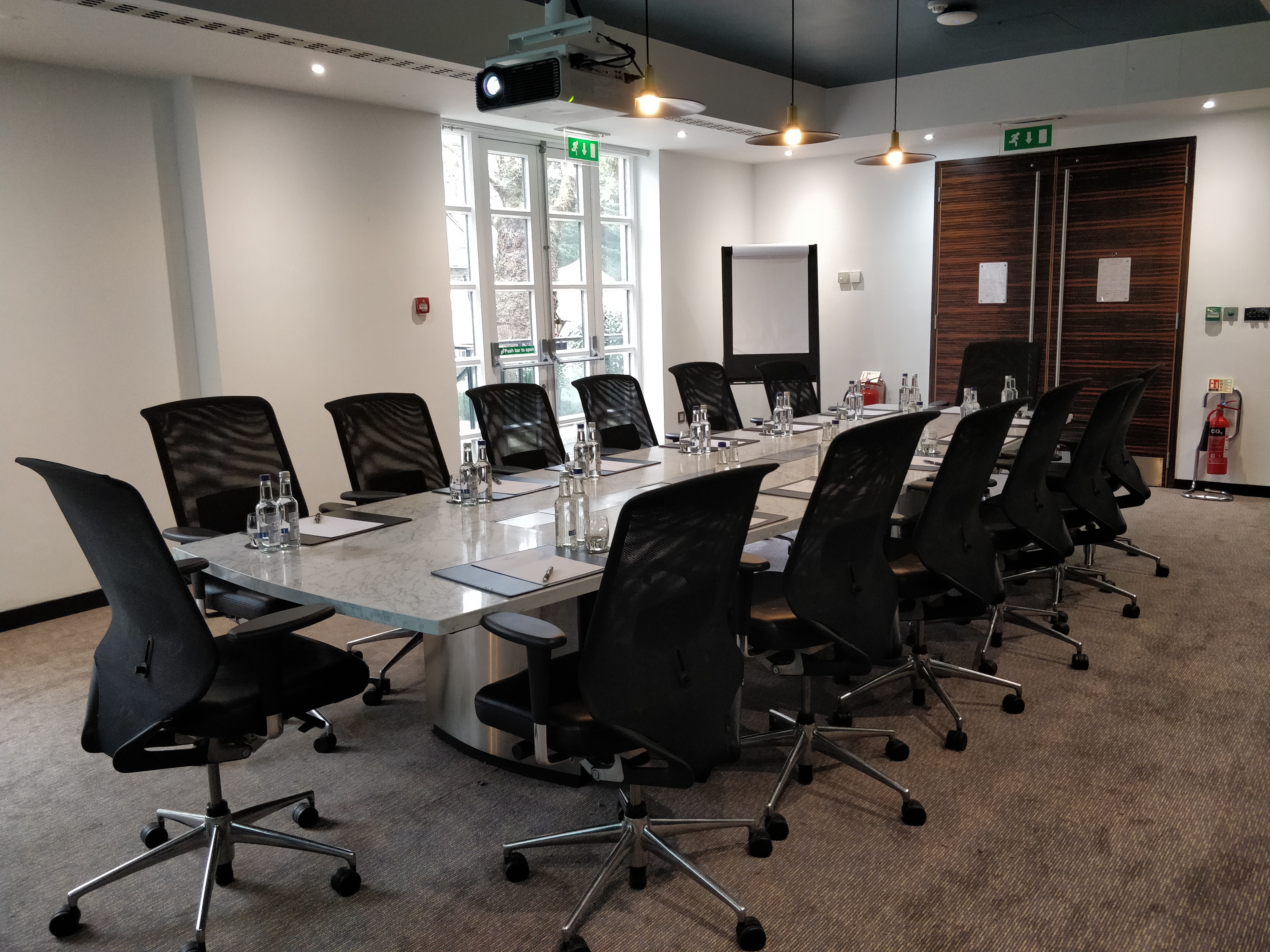 Executive Boardroom at DoubleTree London Kensington, modern design for professional meetings.