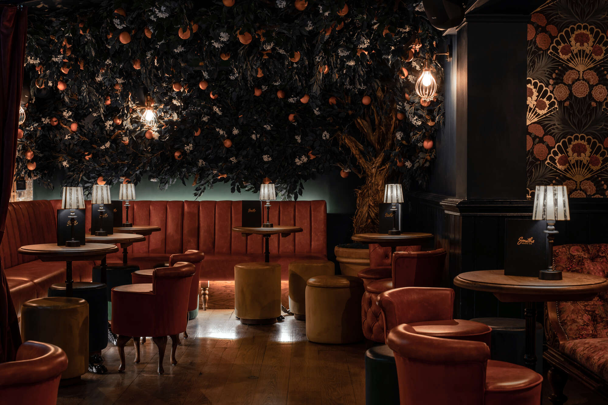 Stylish cocktail bar with lush decor, ideal for upscale events and private gatherings.