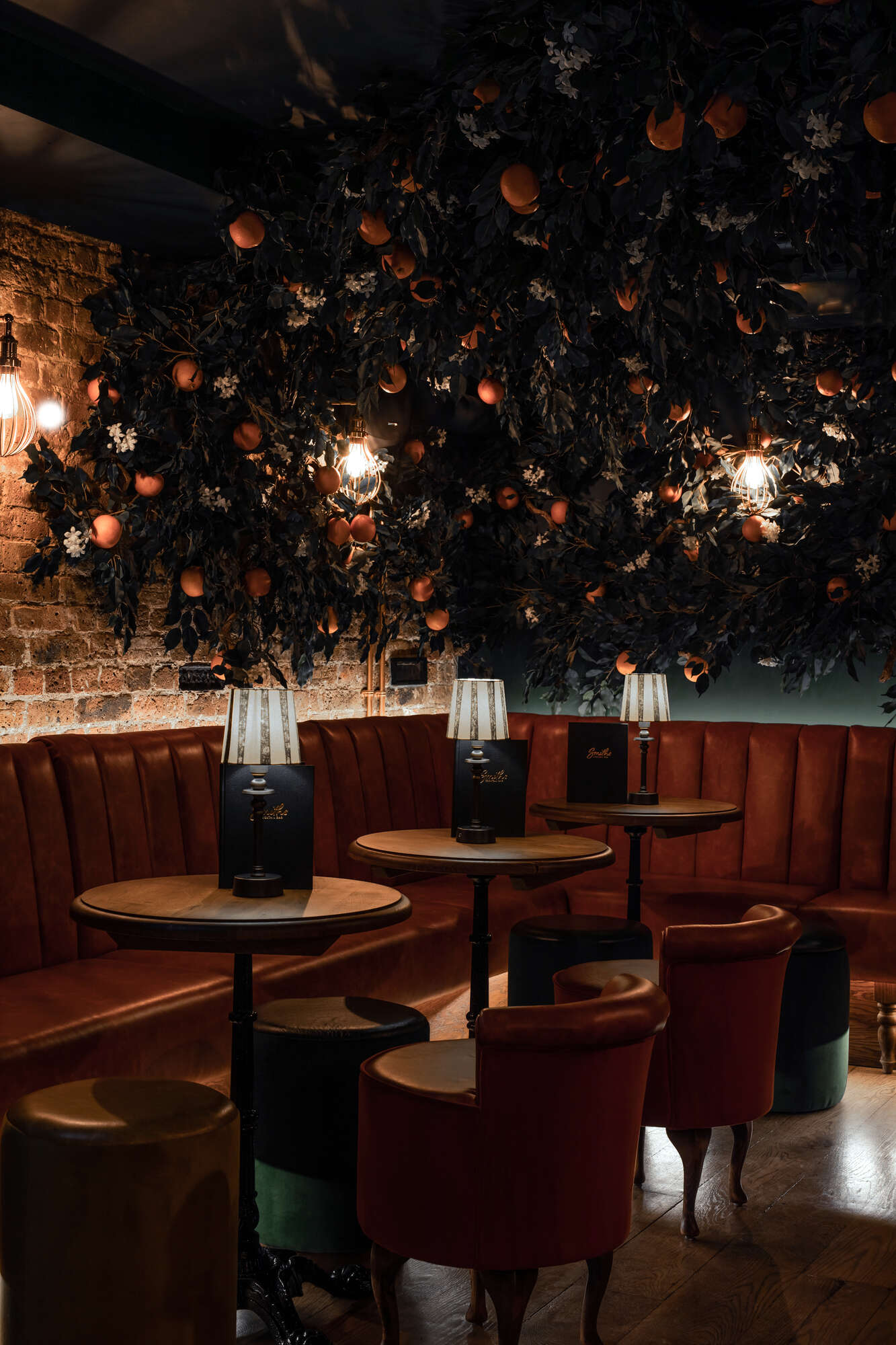 Stylish cocktail bar with warm lighting, ideal for intimate gatherings and networking events.