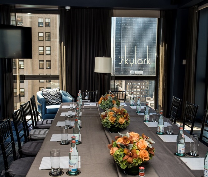 Sophisticated corporate meeting room with city view and elegant decor at The Skylark.