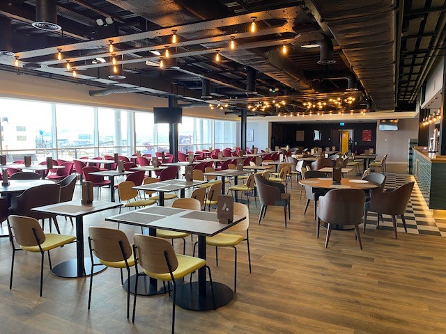 Aspire Lounge at Southampton FC: modern event space with natural light for networking and workshops.