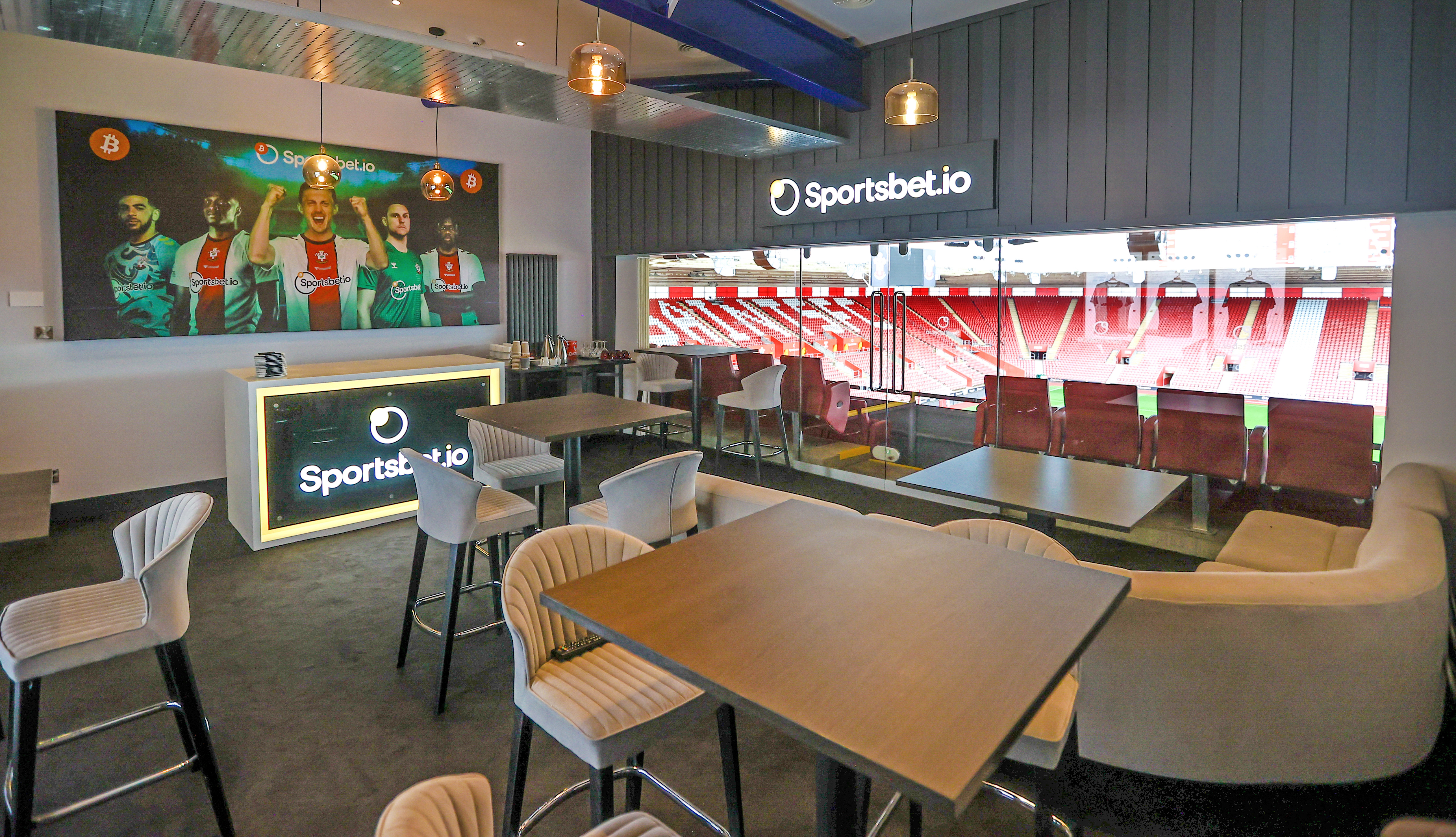 Modern corporate event space with stadium view at Southampton Football Club.