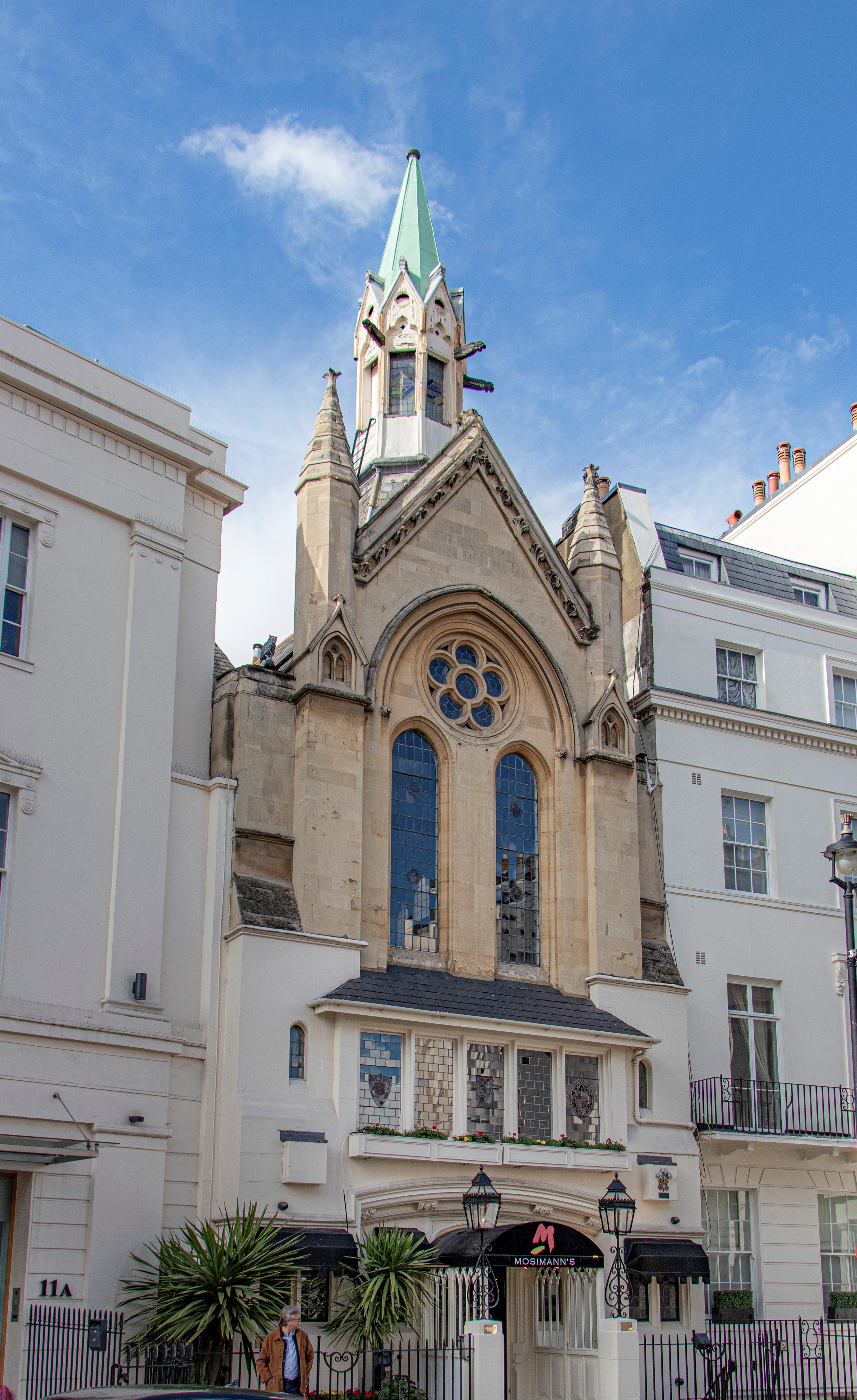 Main Dining Room at Mosimann's with ornate windows, perfect for weddings and events.
