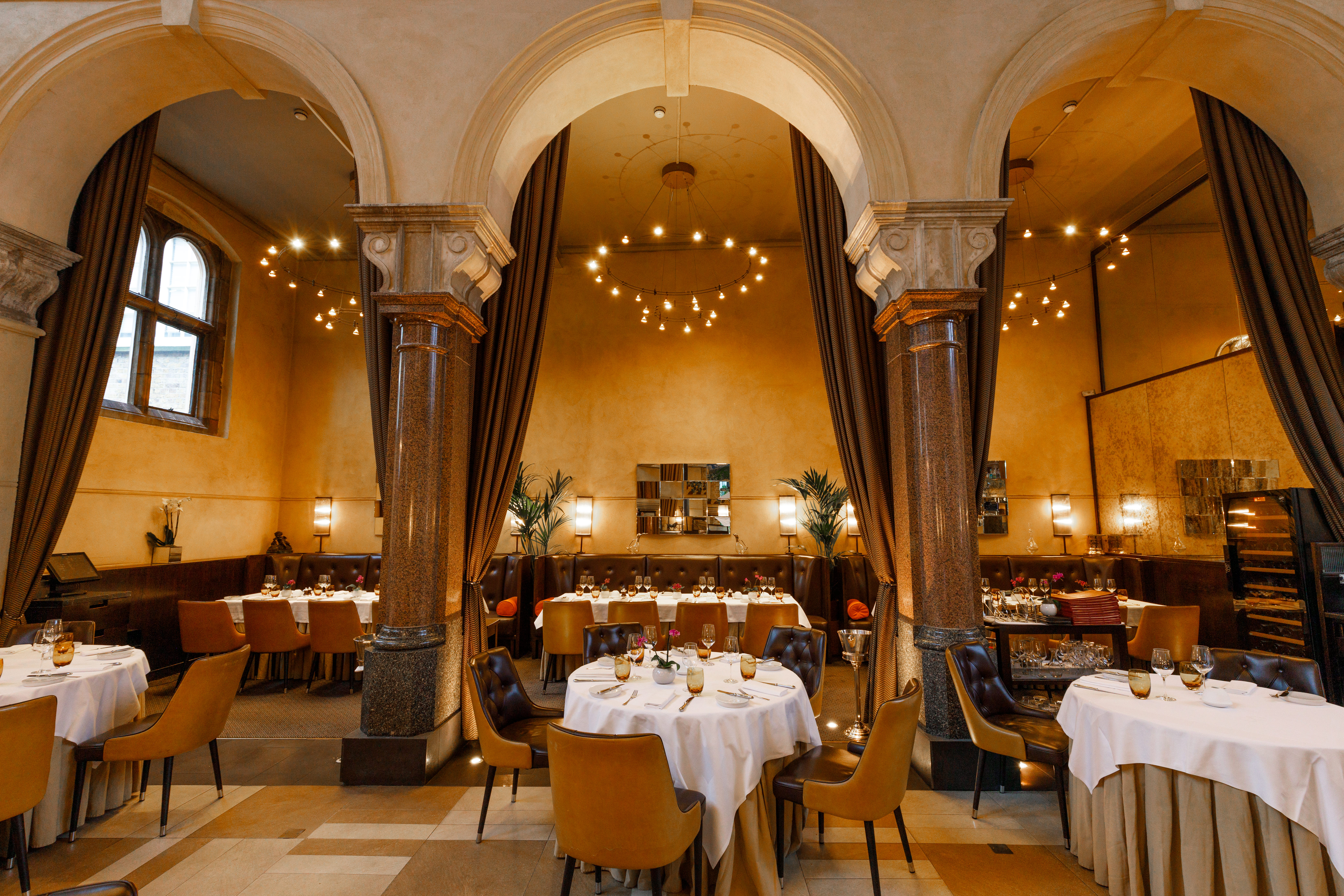 Elegant dining space at The Arch, Galvin La Chapelle for upscale events and gatherings.