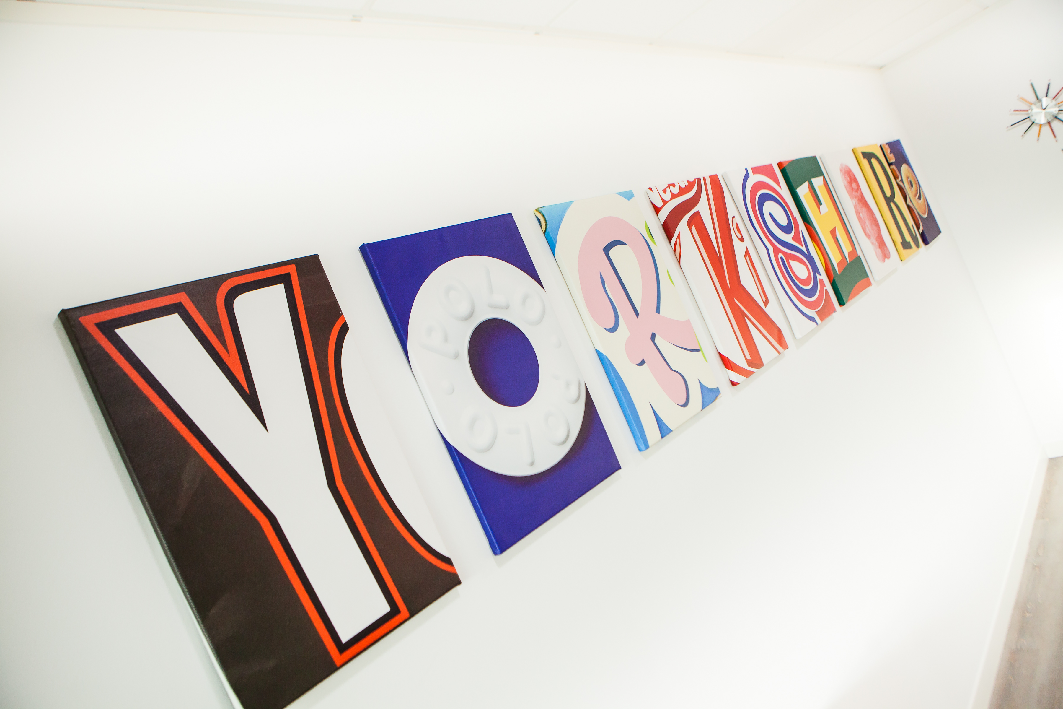 Colorful "YORKSHIRE" letters in Matter Leeds, perfect for cultural events and meetings.