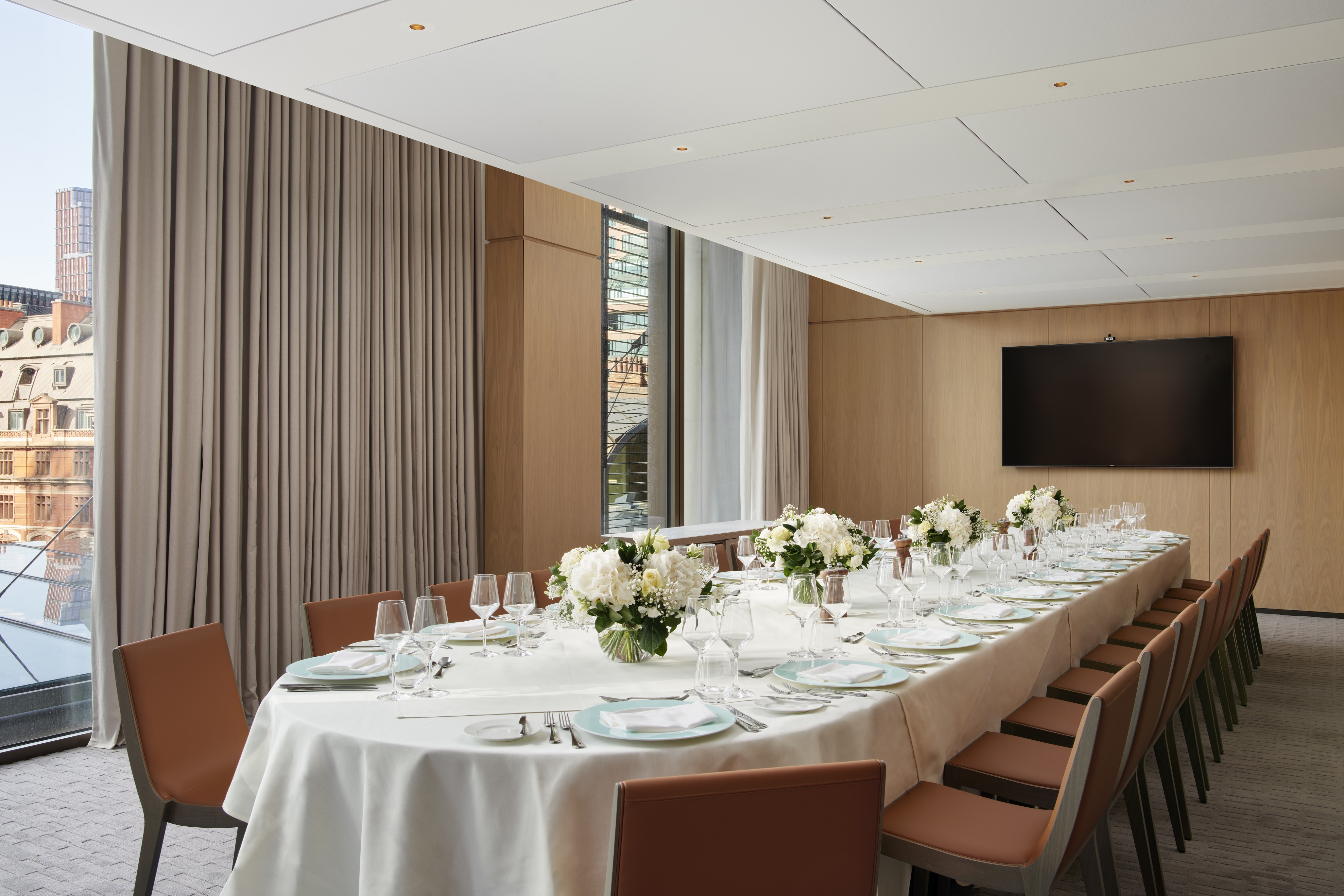Four swans in a sophisticated meeting space for corporate events and intimate gatherings.