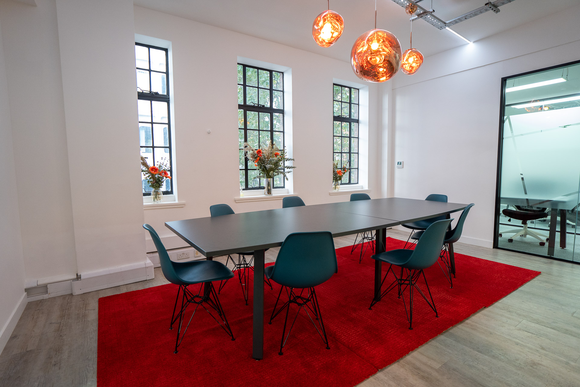 Modern meeting room at Scope Kings Cross with sleek table, ideal for team brainstorming.