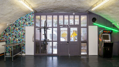 Railway Arch 463 in Hackney: vibrant floral wallpaper, ideal for events and gatherings.