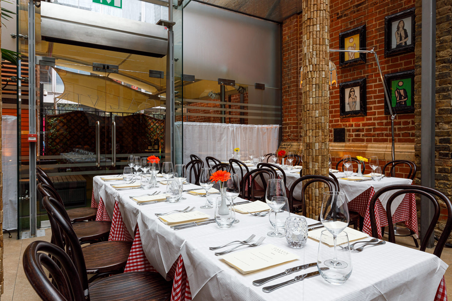 Charming dining space with checkered tablecloths for intimate gatherings and corporate events.