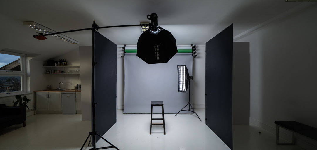 Foster Studios photography studio with adjustable lighting for professional shoots.