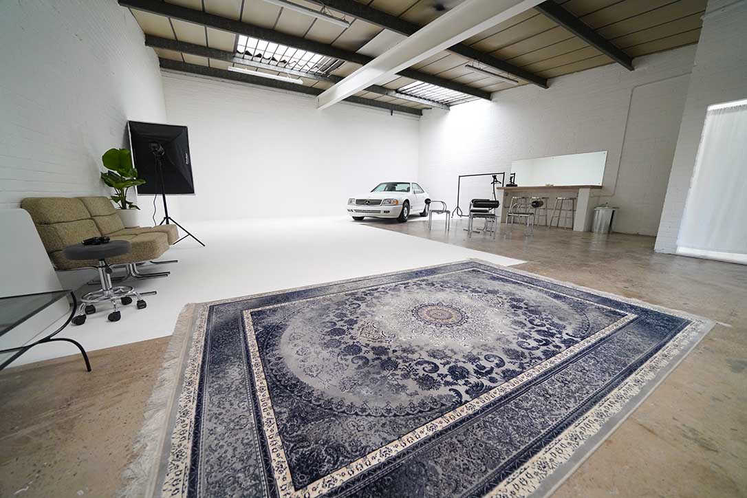 Ancoats Studio event space with classic car, ideal for product launches and photo shoots.