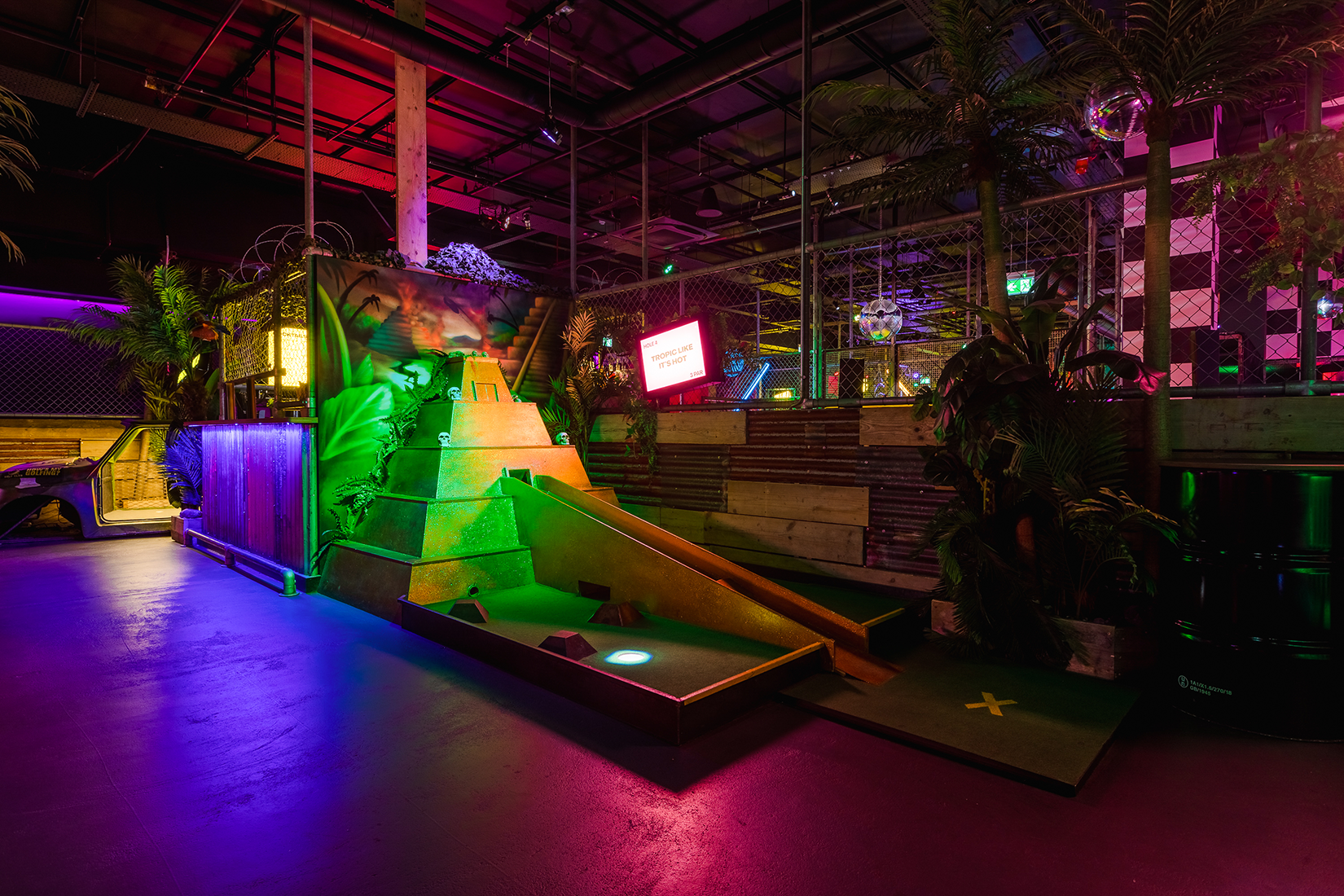 Pablo at Junkyard Golf Club, vibrant mini-golf venue for corporate events and team-building.