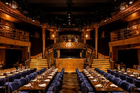 Main Ballroom at Lio London, elegant seating for upscale events and performances.