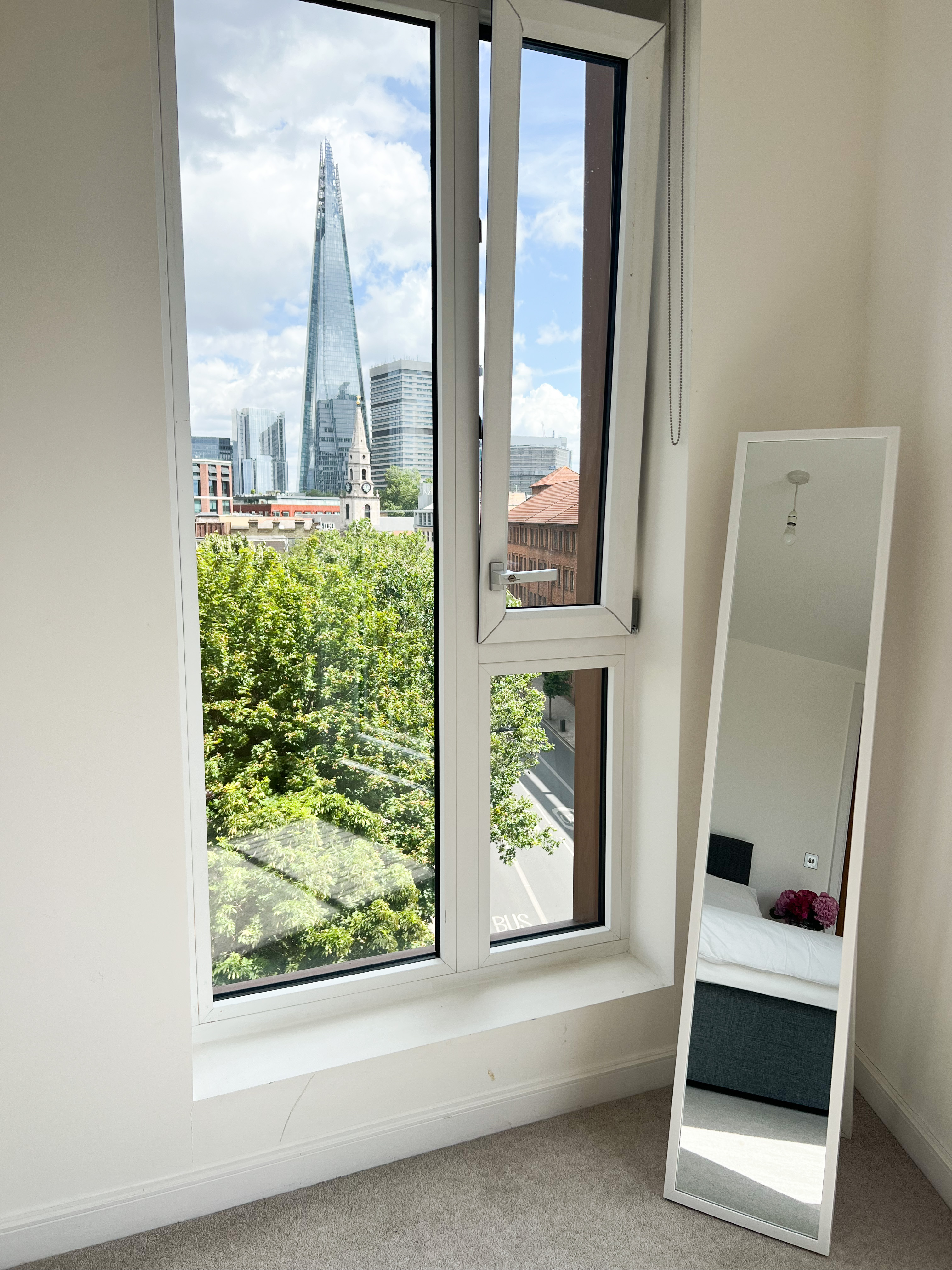 Modern London penthouse with skyline views, perfect for creative meetings and events.