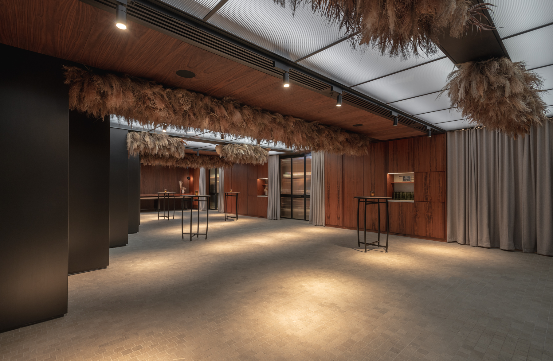 Modern event space at Dunstan Den, Canopy by Hilton, ideal for networking and receptions.