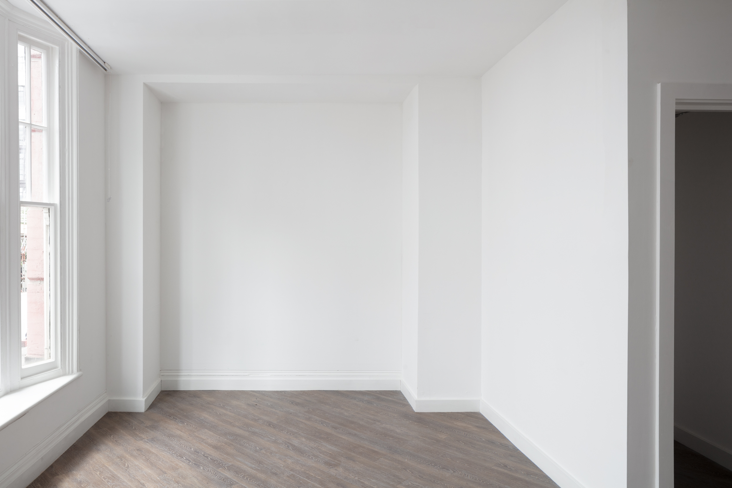 Minimalist gallery space with natural light for workshops and events in Fitzrovia.