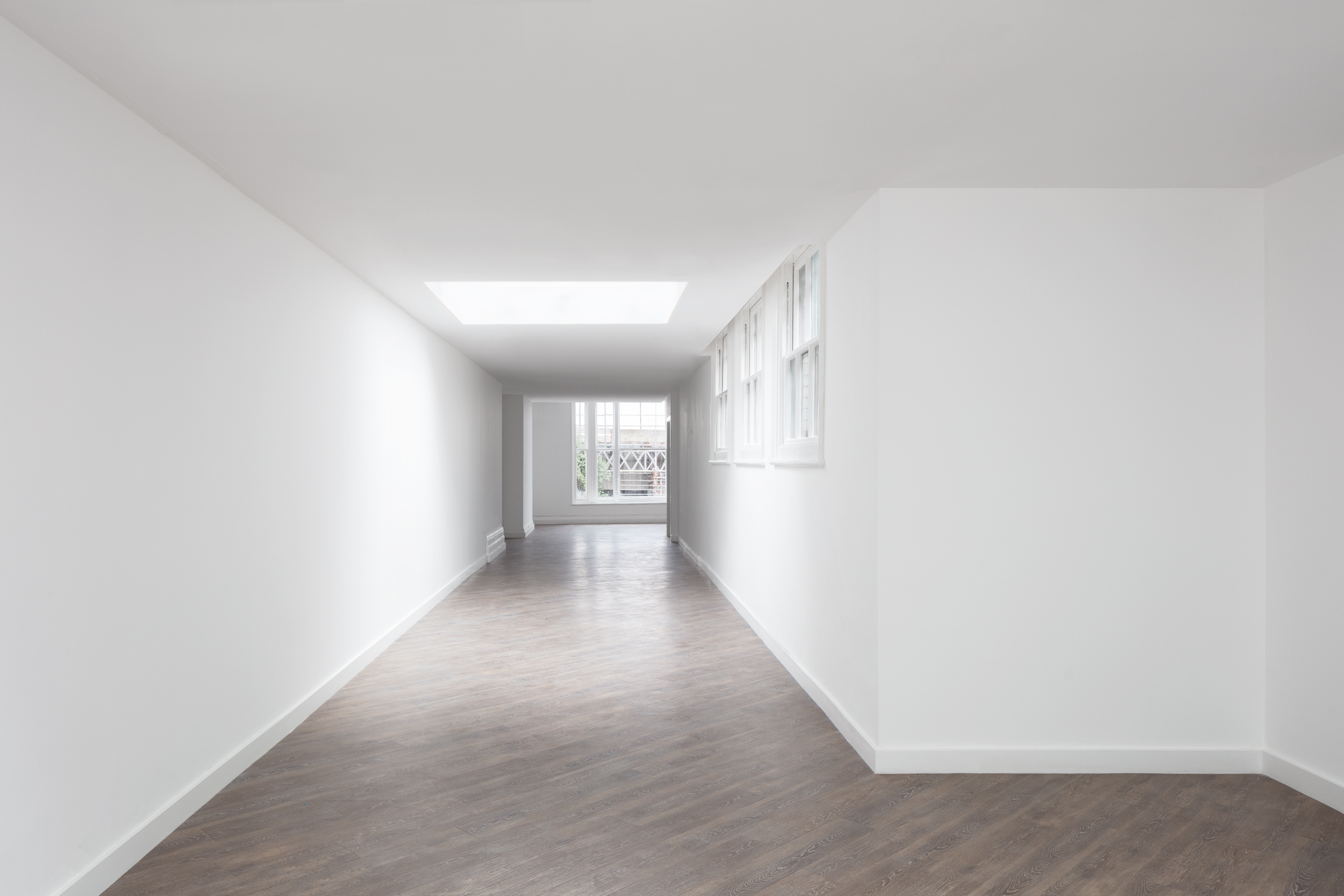 Spacious, well-lit corridor in The Gallery Fitzrovia for creative events and networking.