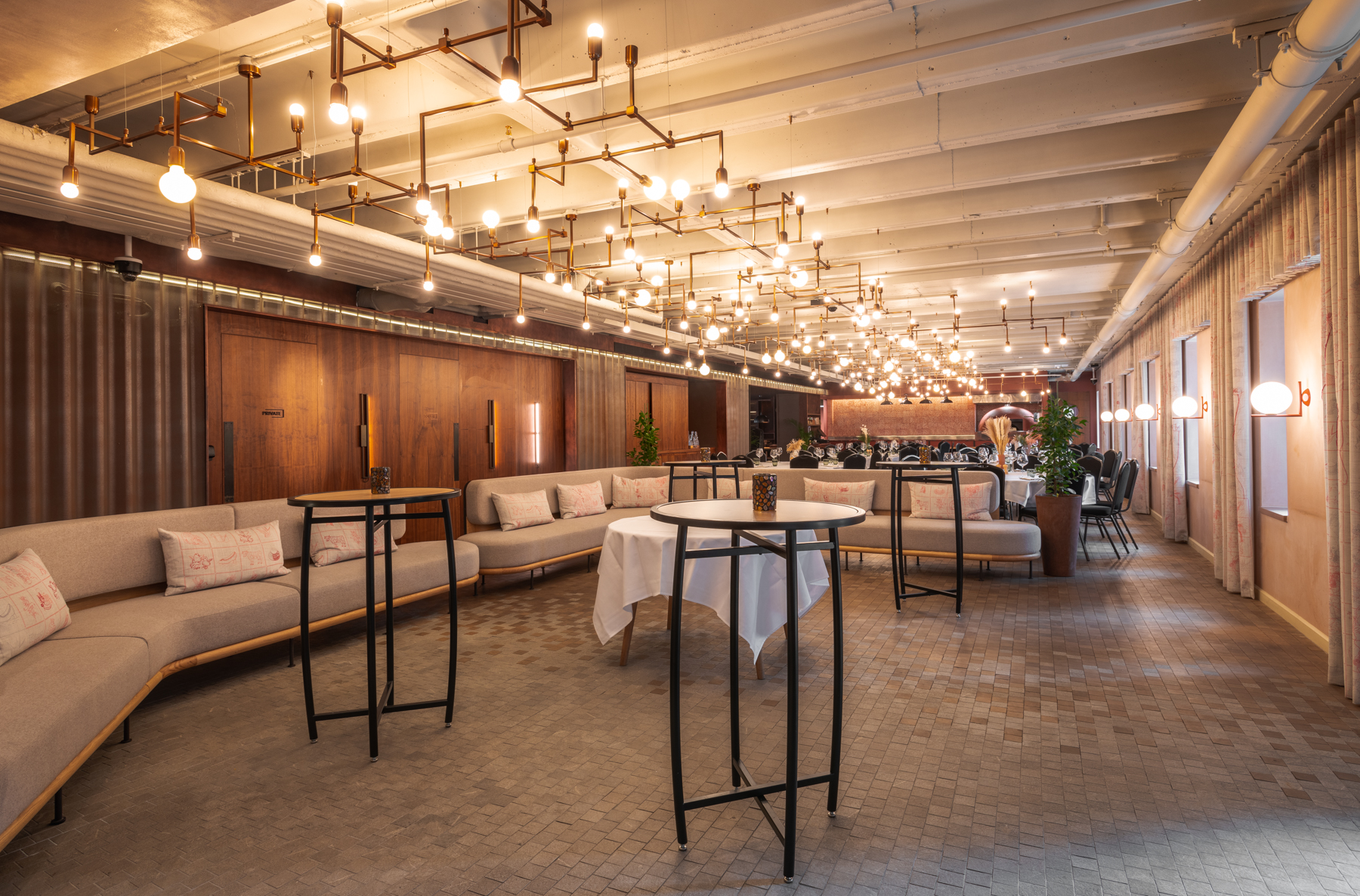 Stylish event space at Canopy by Hilton London City with modern lighting for gatherings.
