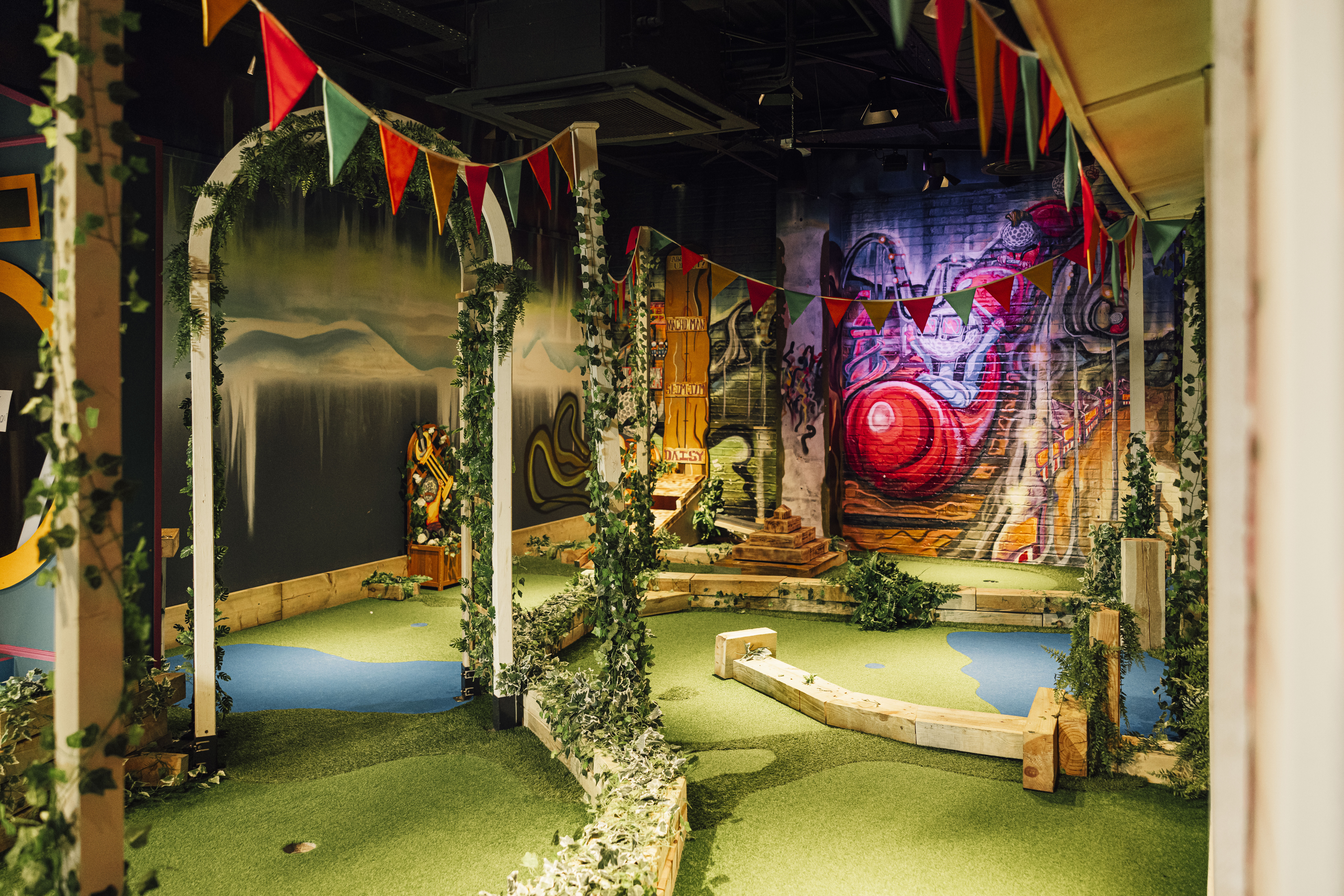 Vibrant event space at Caddies Crawley, perfect for team-building and networking.