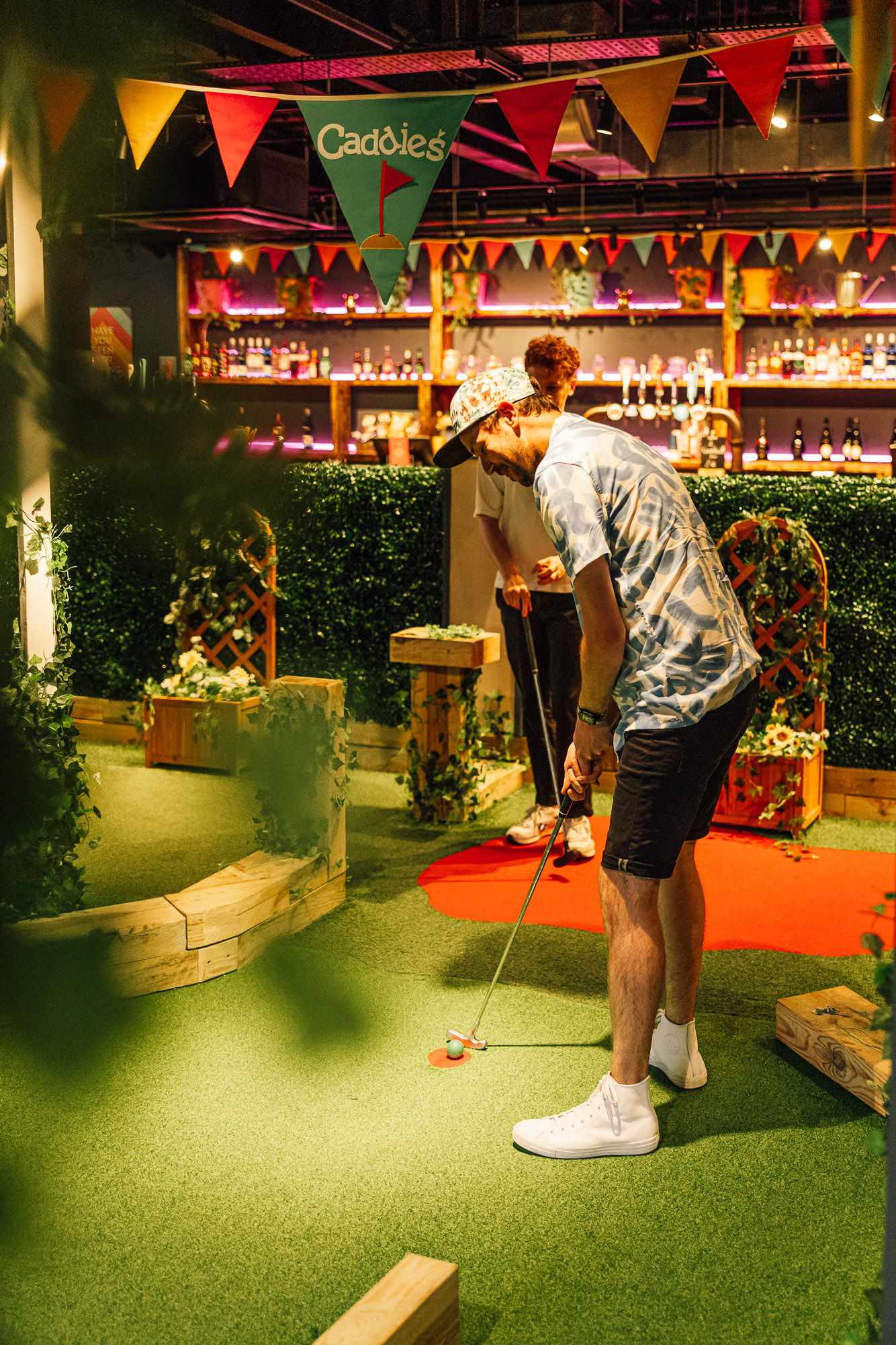 Vibrant mini-golf venue in Caddies Crawley for team-building and networking events.