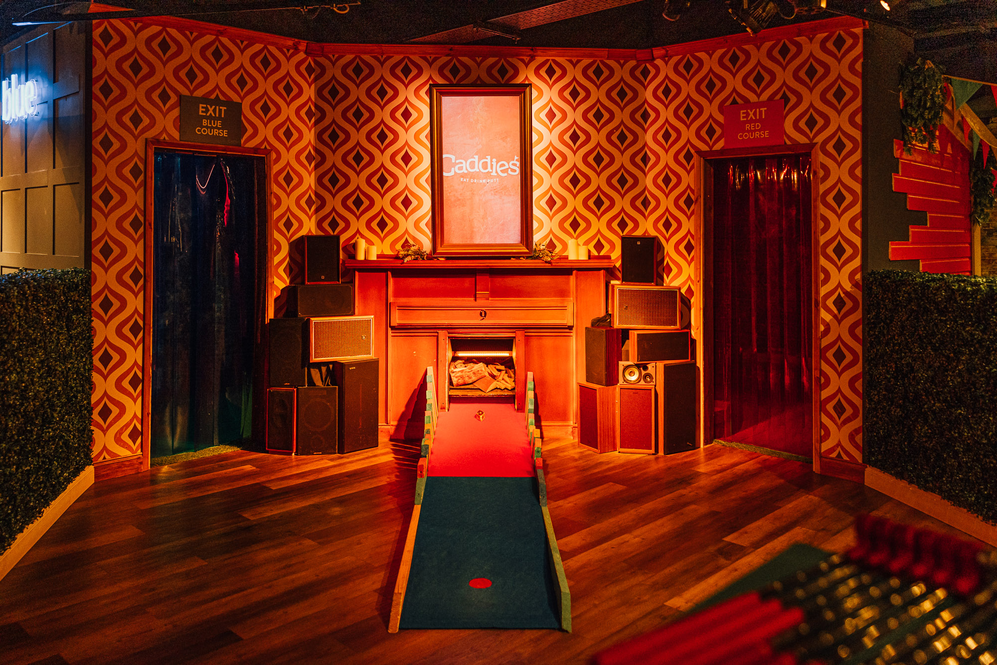 Whole Venue in Caddies Crawley, vibrant retro decor, ideal for interactive events and parties.