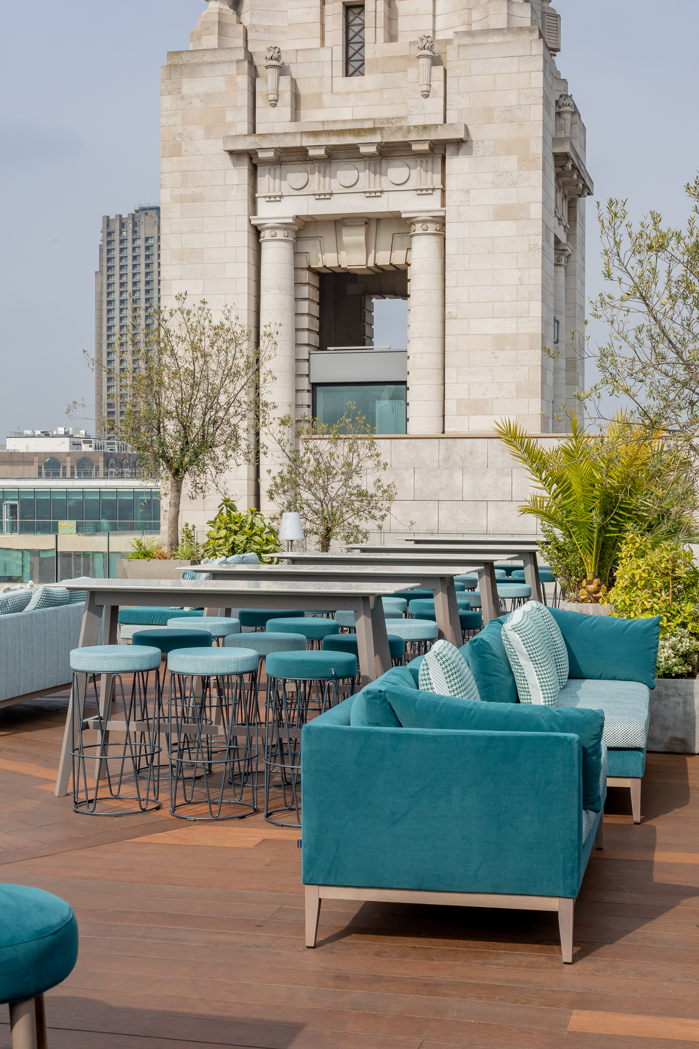 Stylish rooftop venue with modern seating, perfect for upscale cocktail receptions.