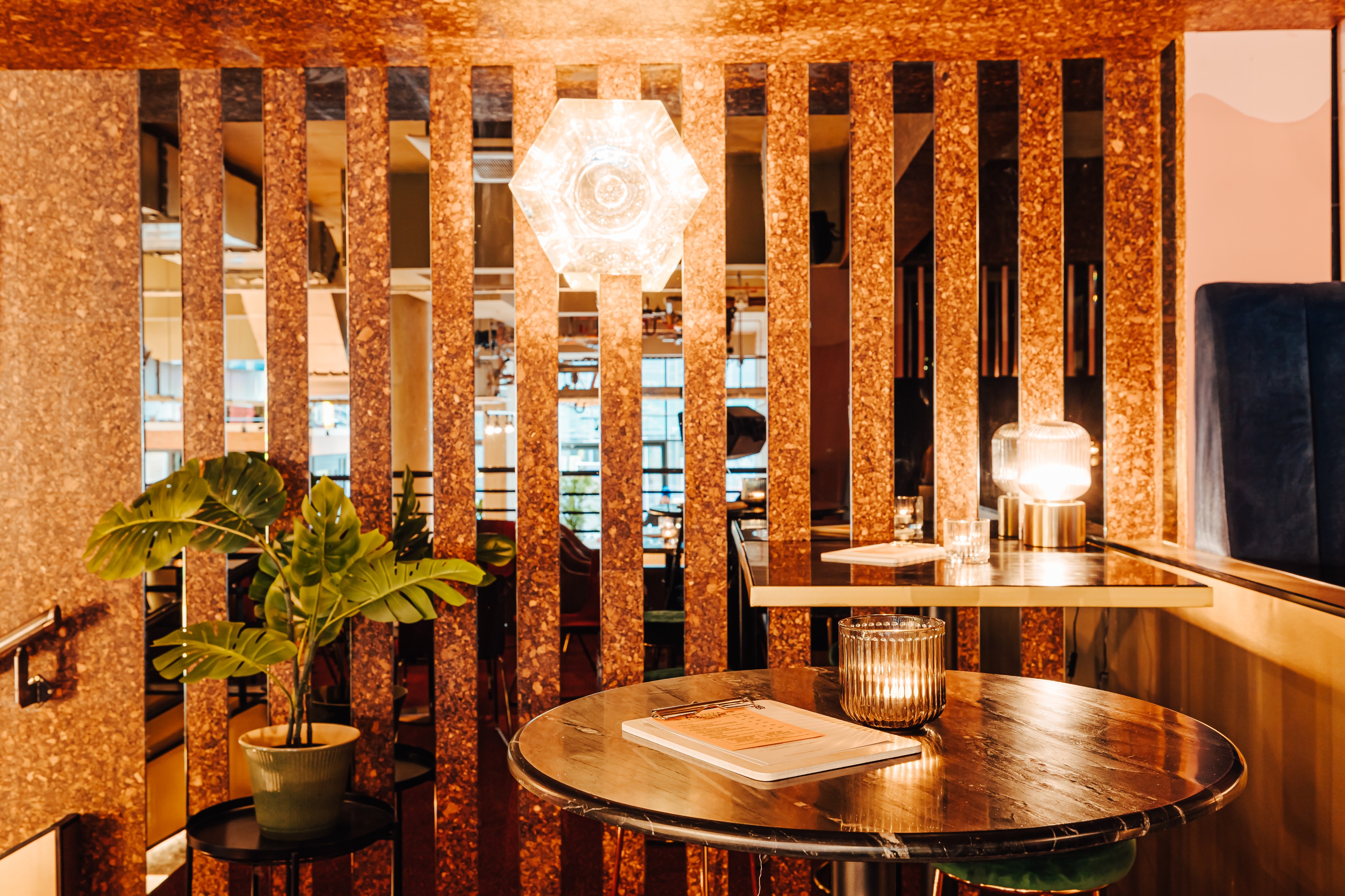 Stylish Mezzanine meeting space with warm lighting, ideal for upscale events and gatherings.