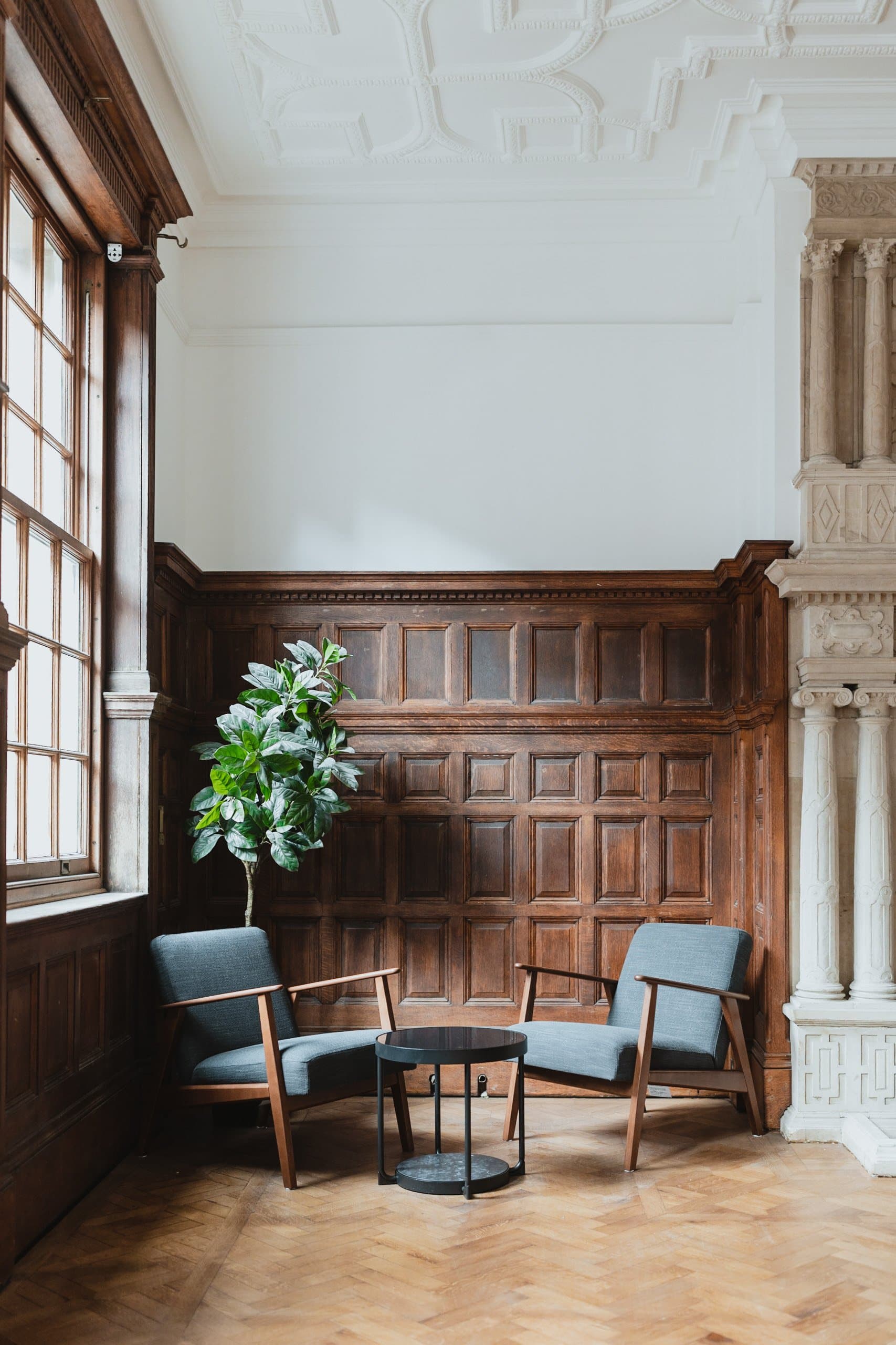 The Brunel at Armada House: Elegant wood-paneled breakout space for networking and meetings.