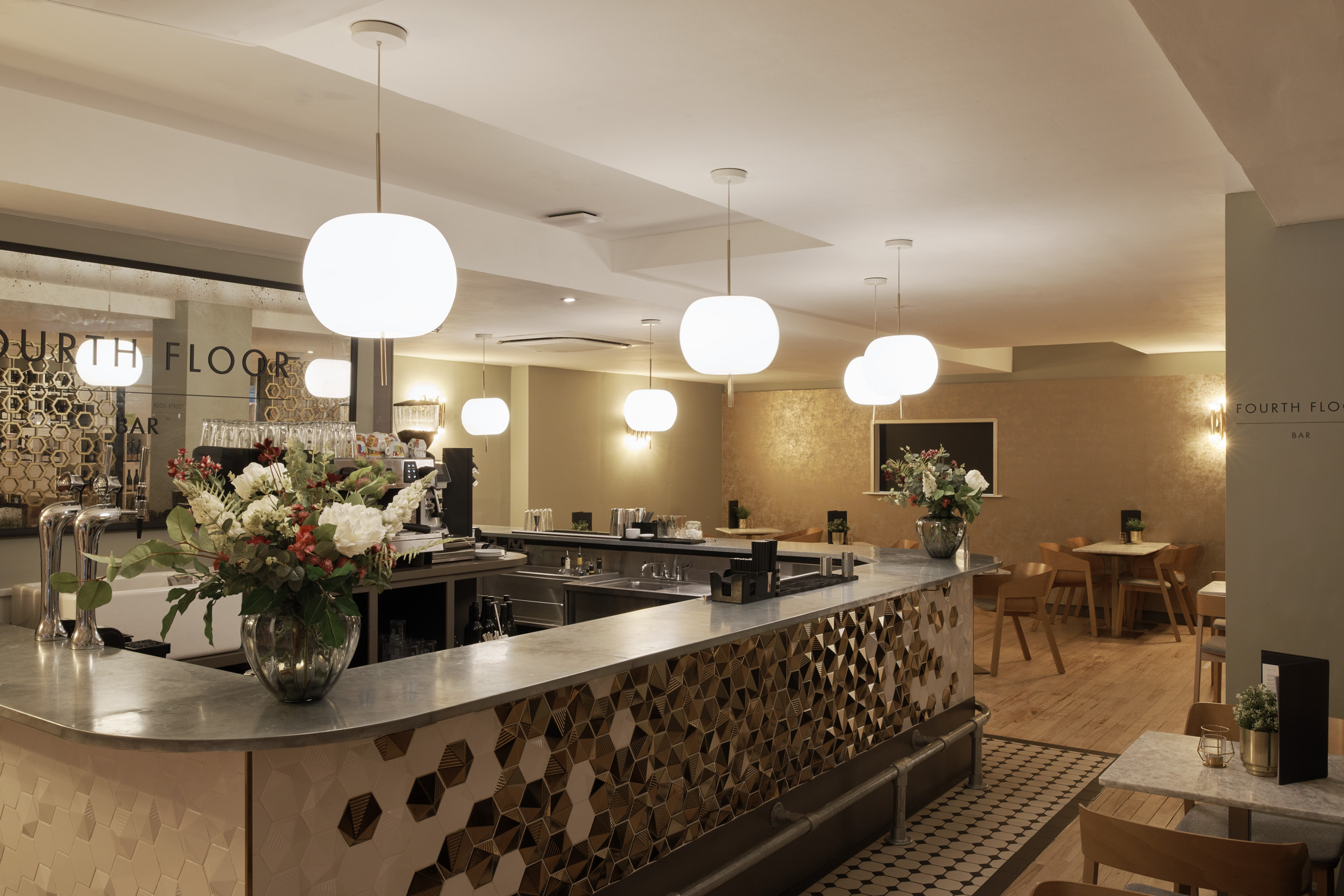 Modern Fourth Floor Bar in Harvey Nichols Leeds, ideal for networking events and gatherings.
