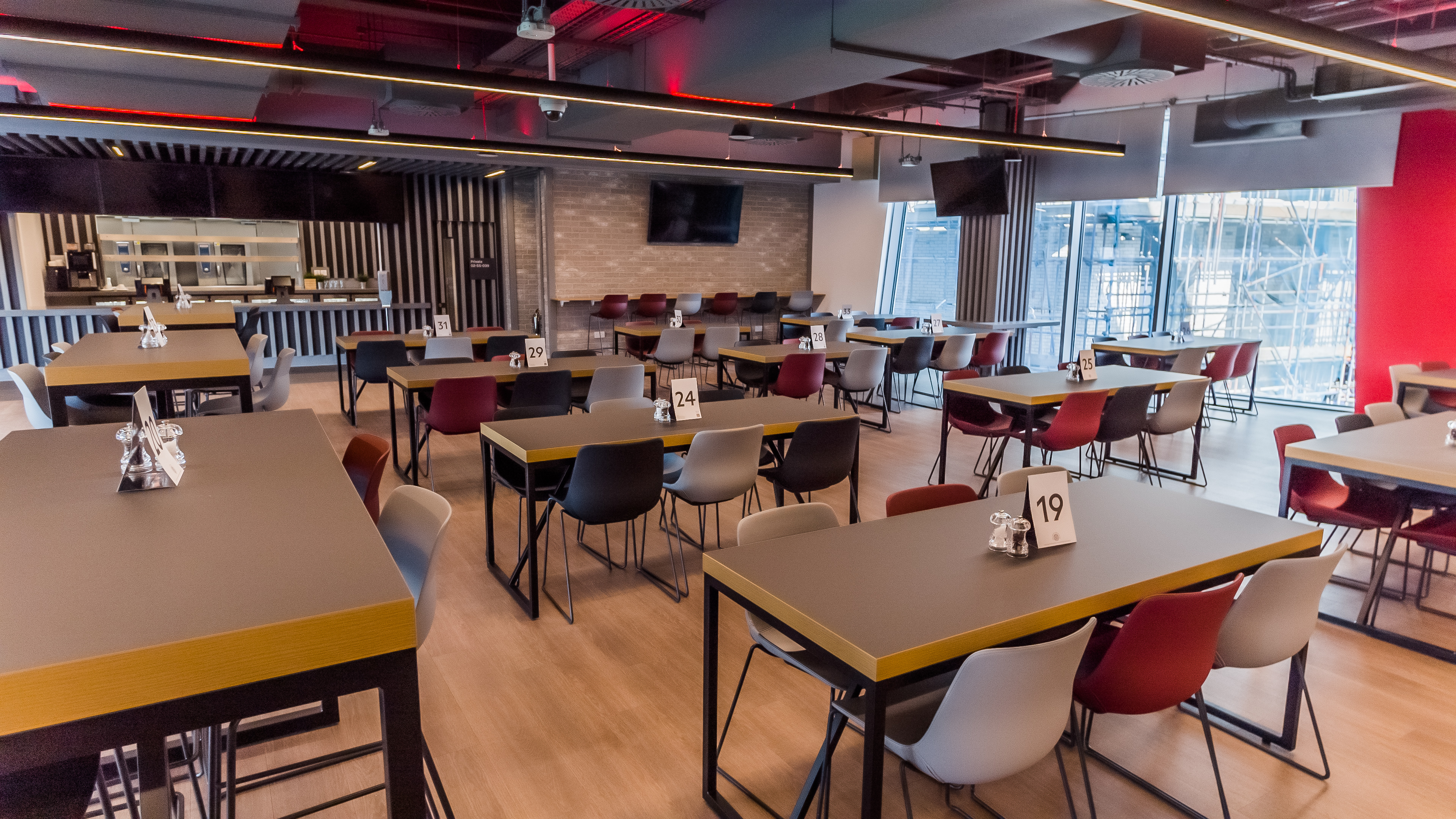 Modern event space at Brentford FC with flexible seating for networking and presentations.