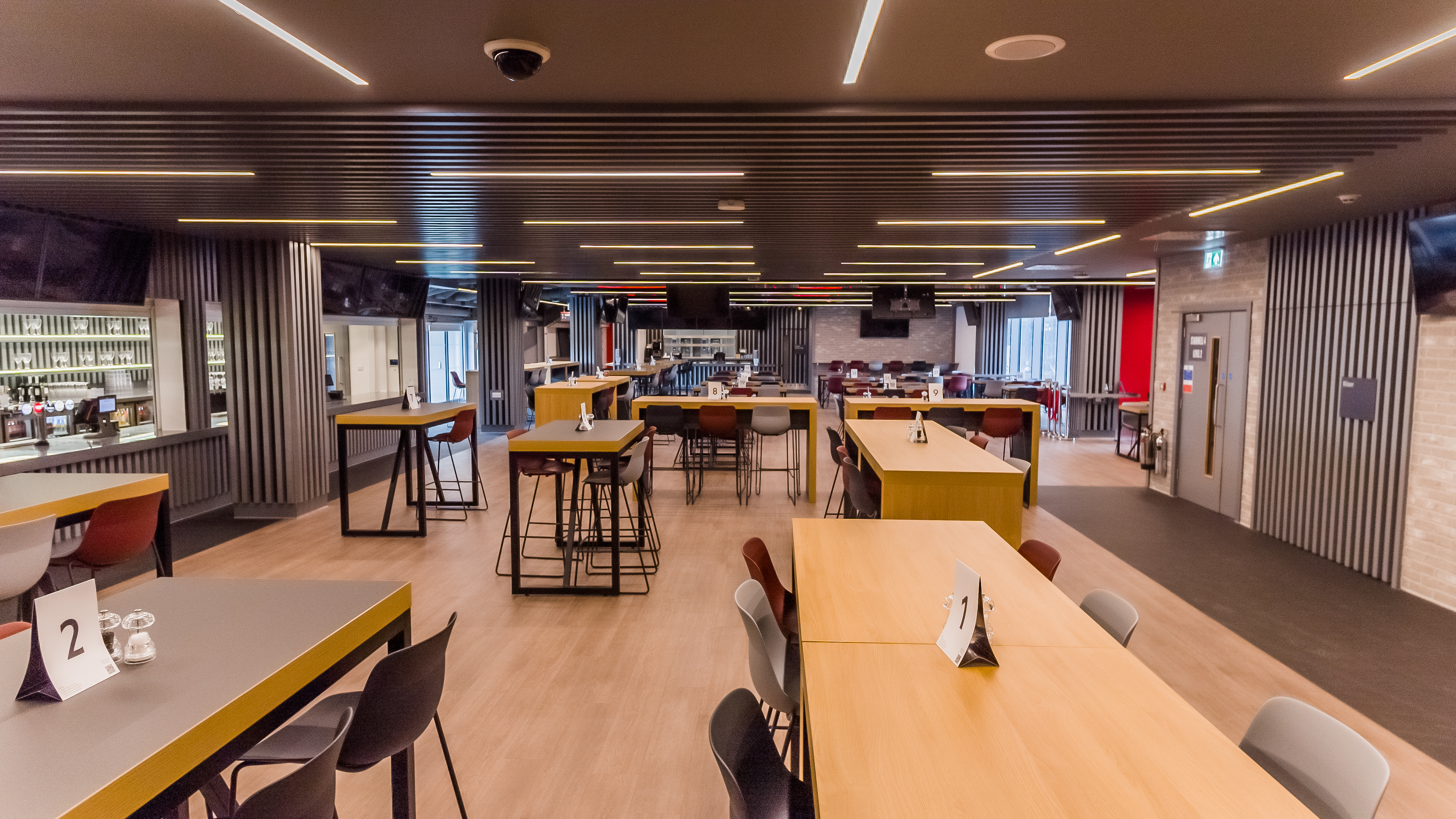 Modern event space at Brentford FC with flexible seating for meetings and gatherings.